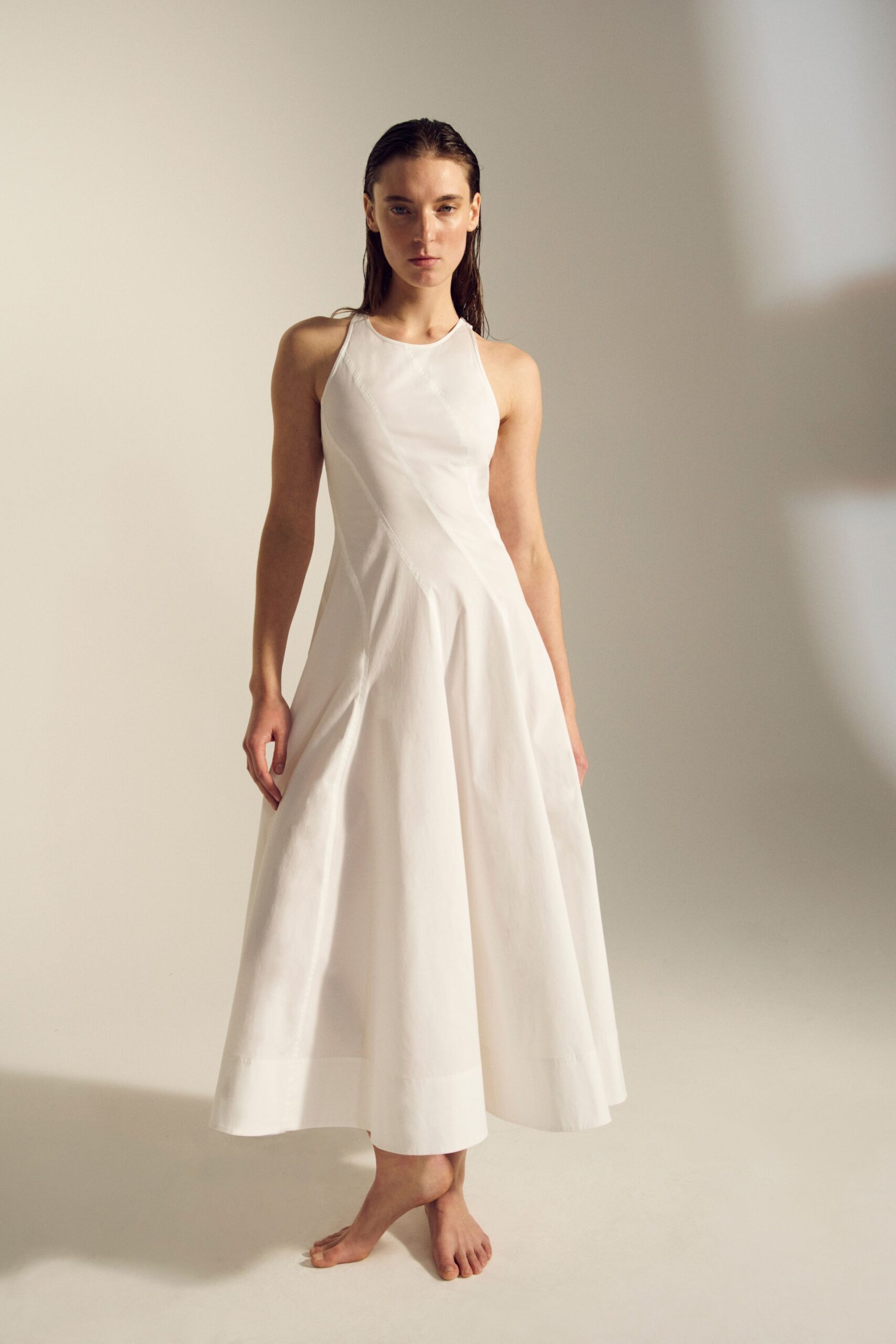 white fitted sleeveless dress