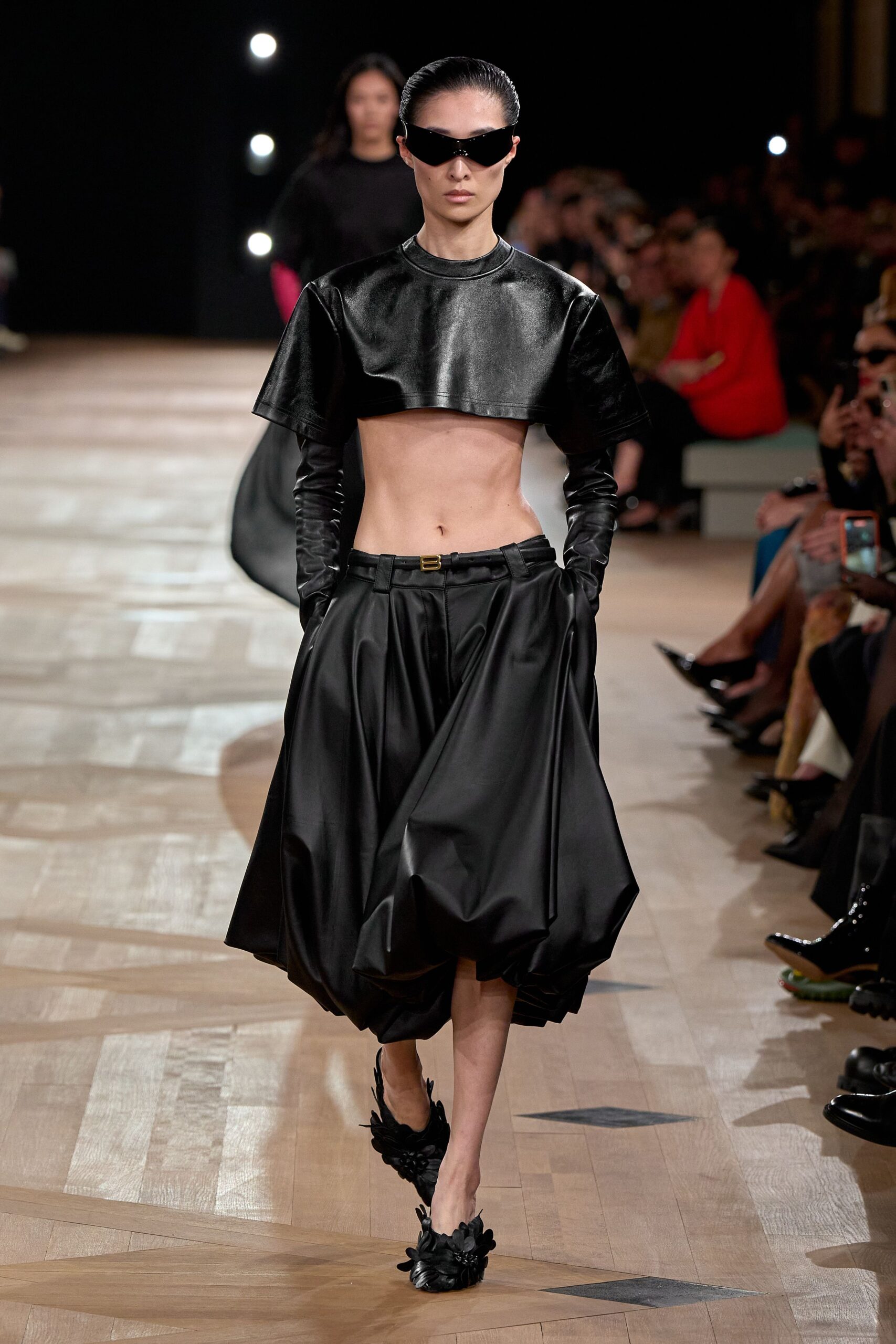 black leather fitted top and skirt