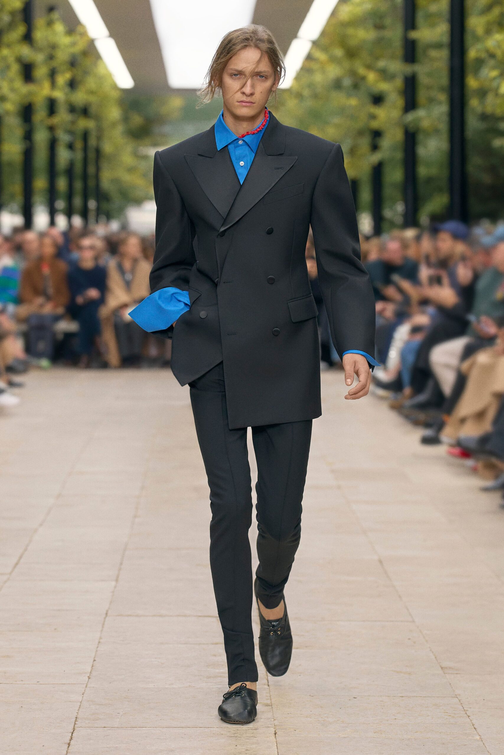 black tailored blazer with blue shirt