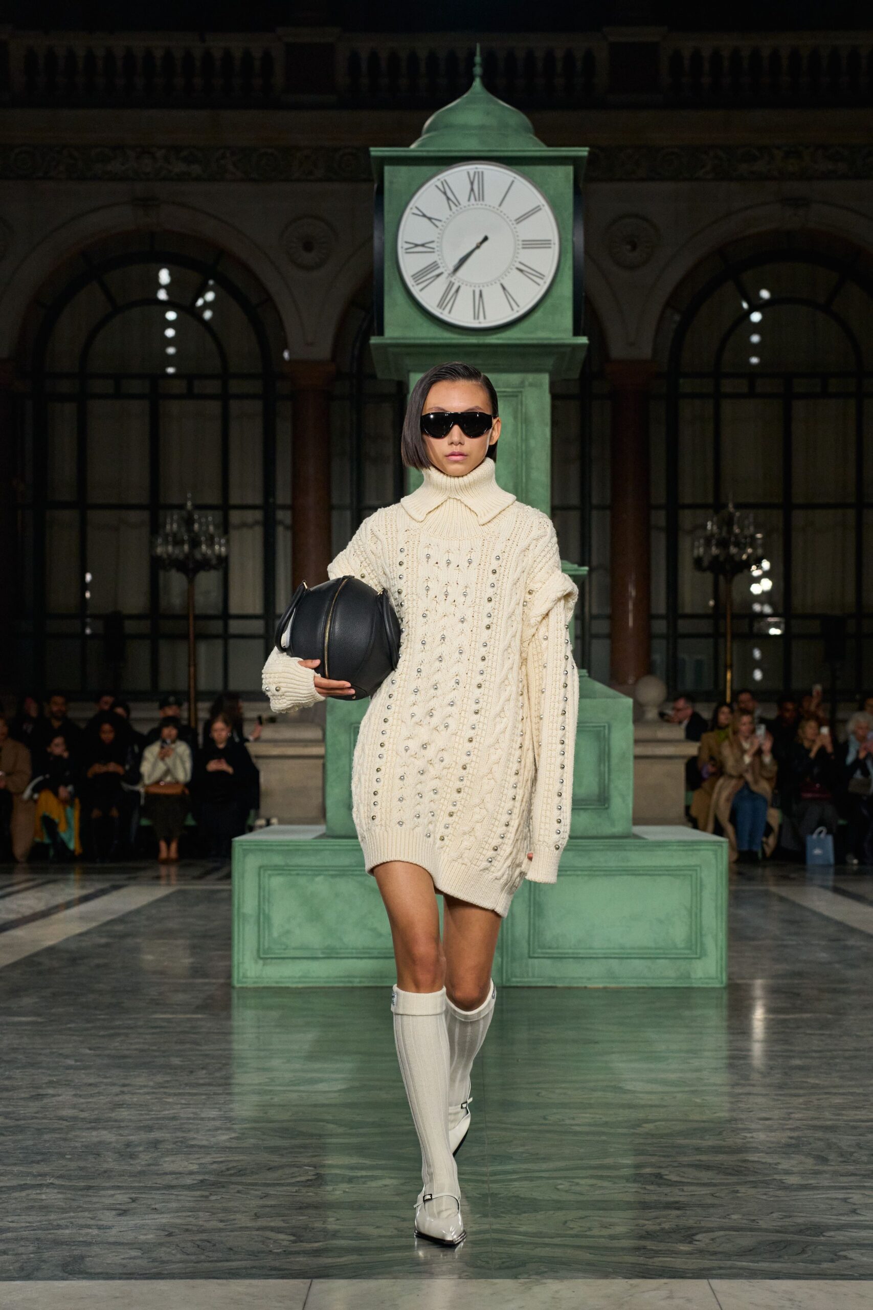white fitted sweater with sunglasses