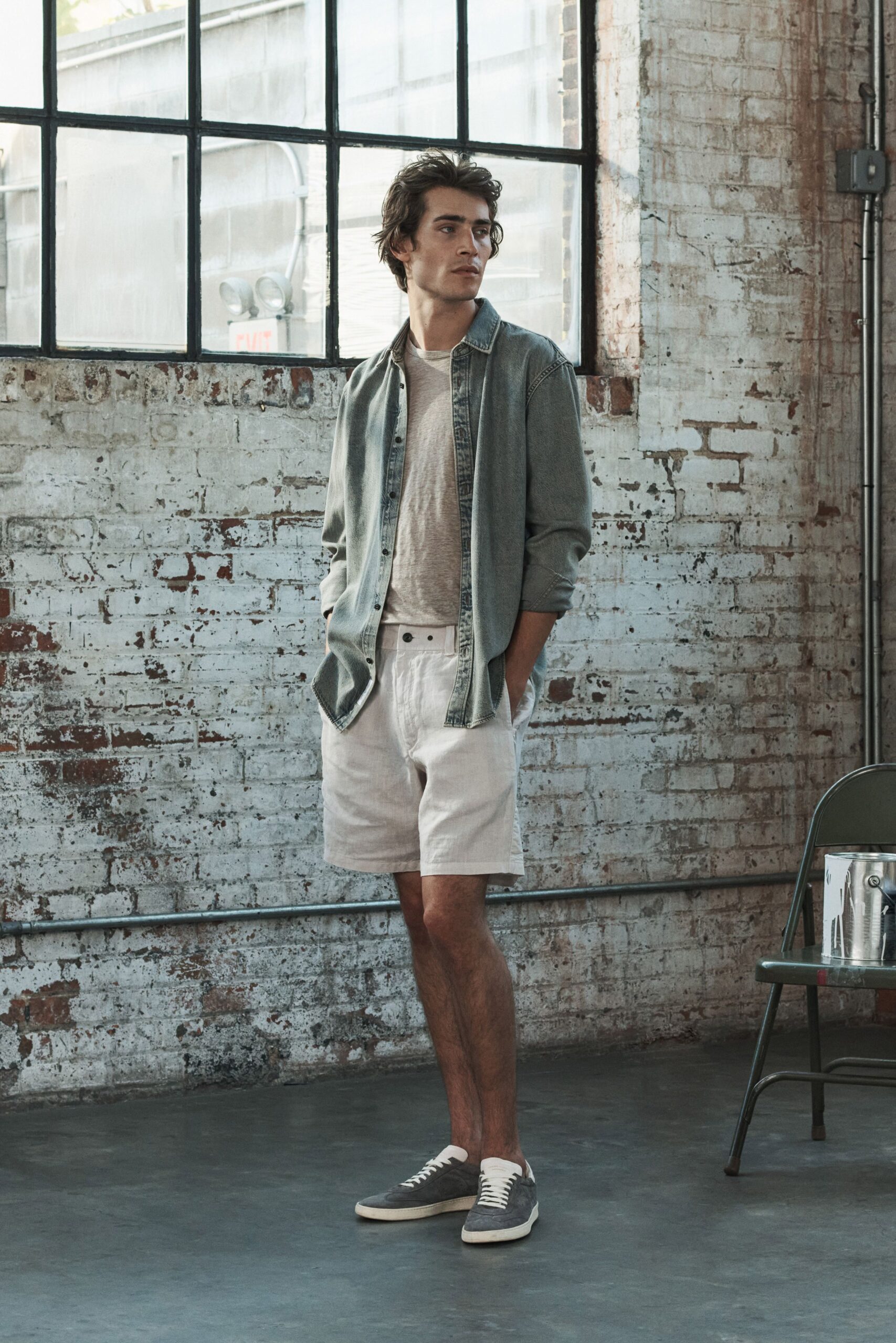 gray relaxed shirt with white shorts