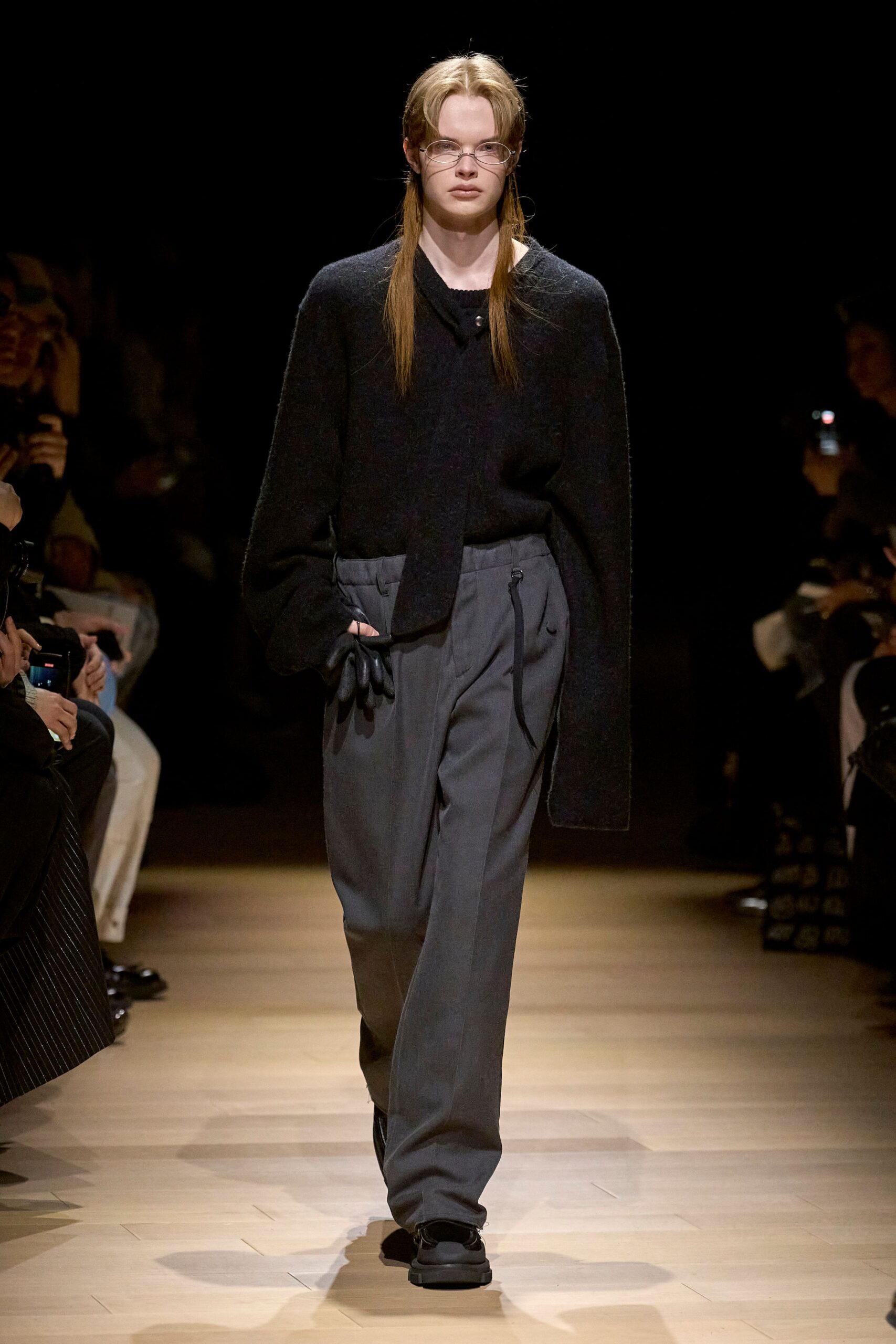 black relaxed sweater with gray pants