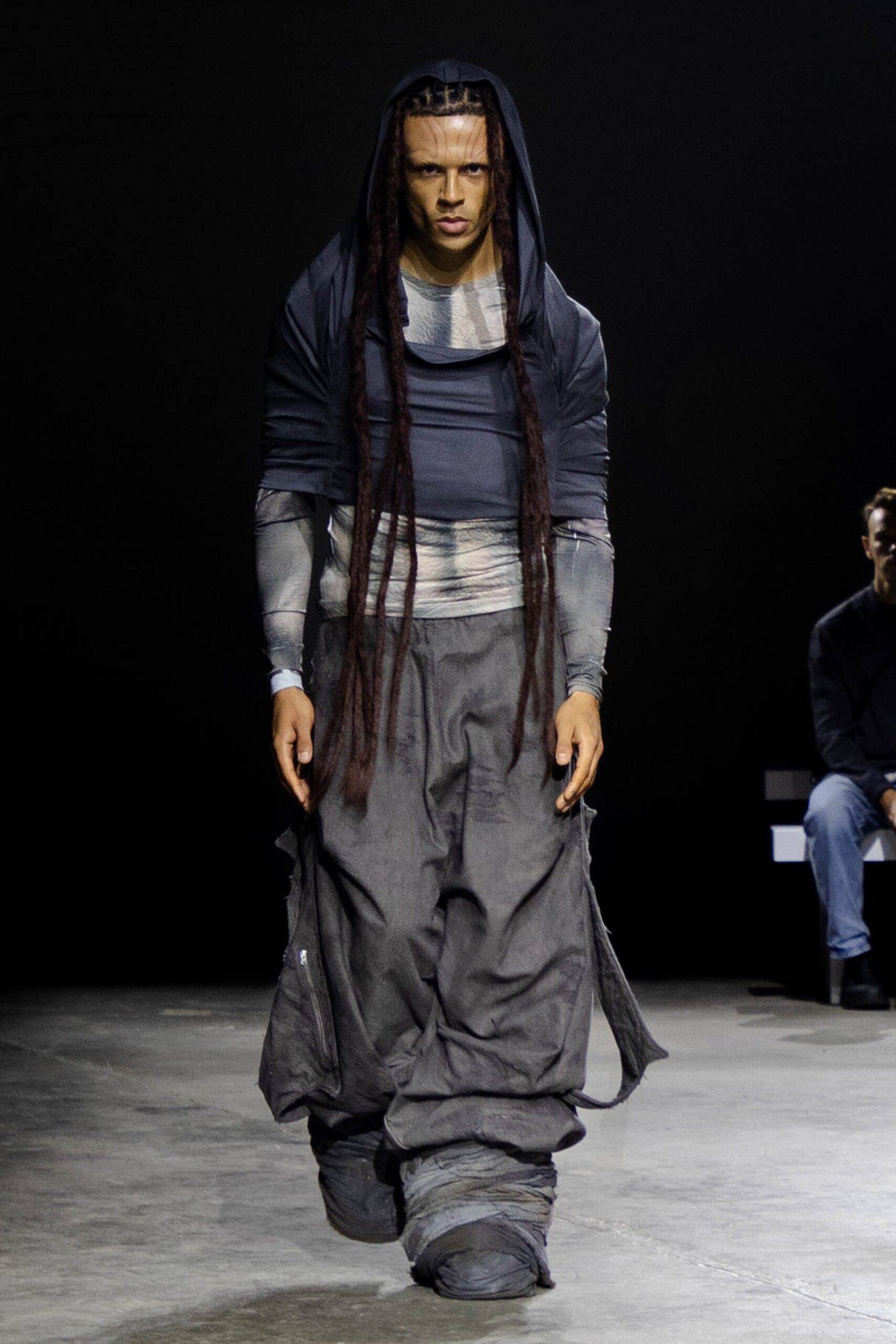 black relaxed top gray wide-leg pants