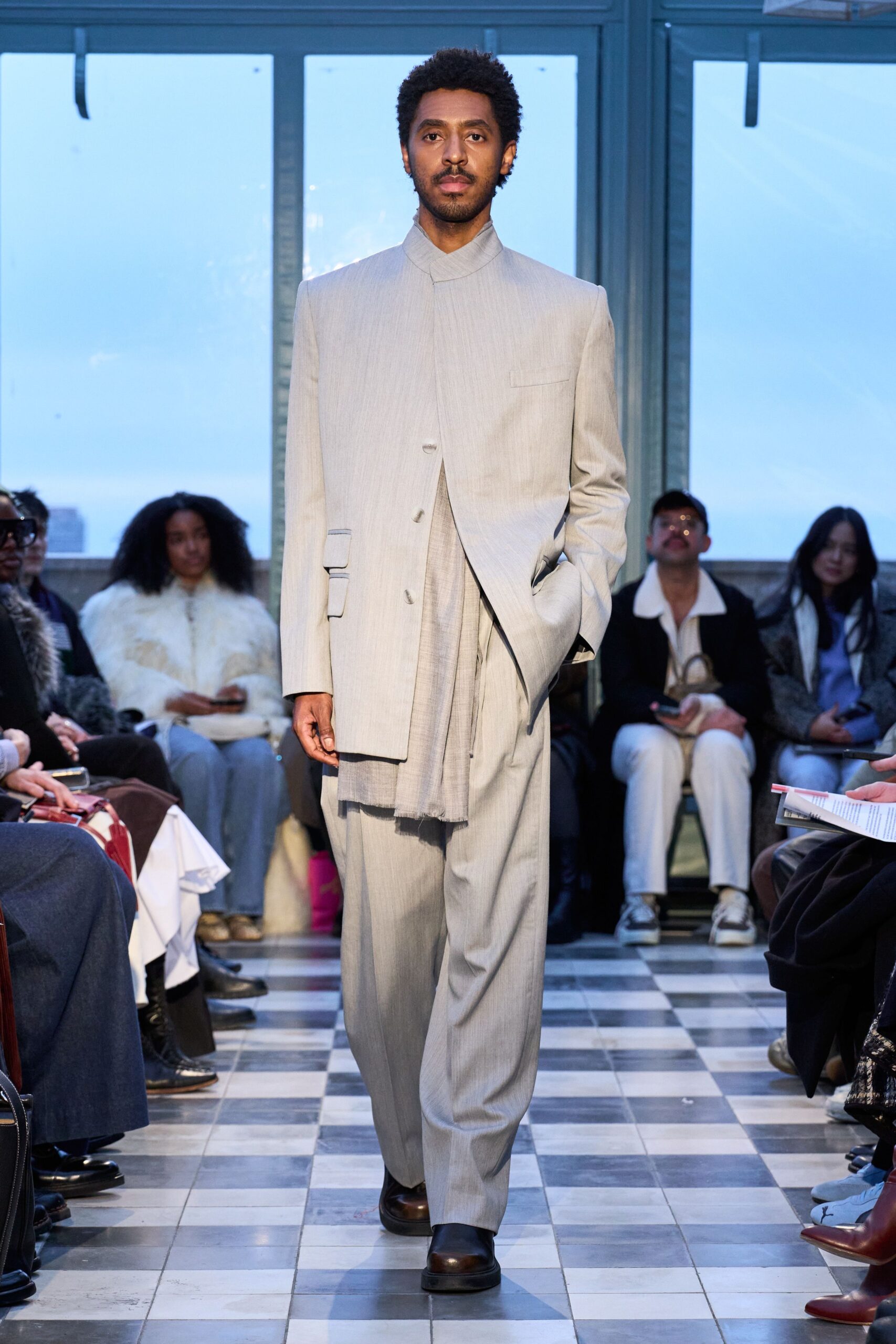 gray tailored suit with black shoes