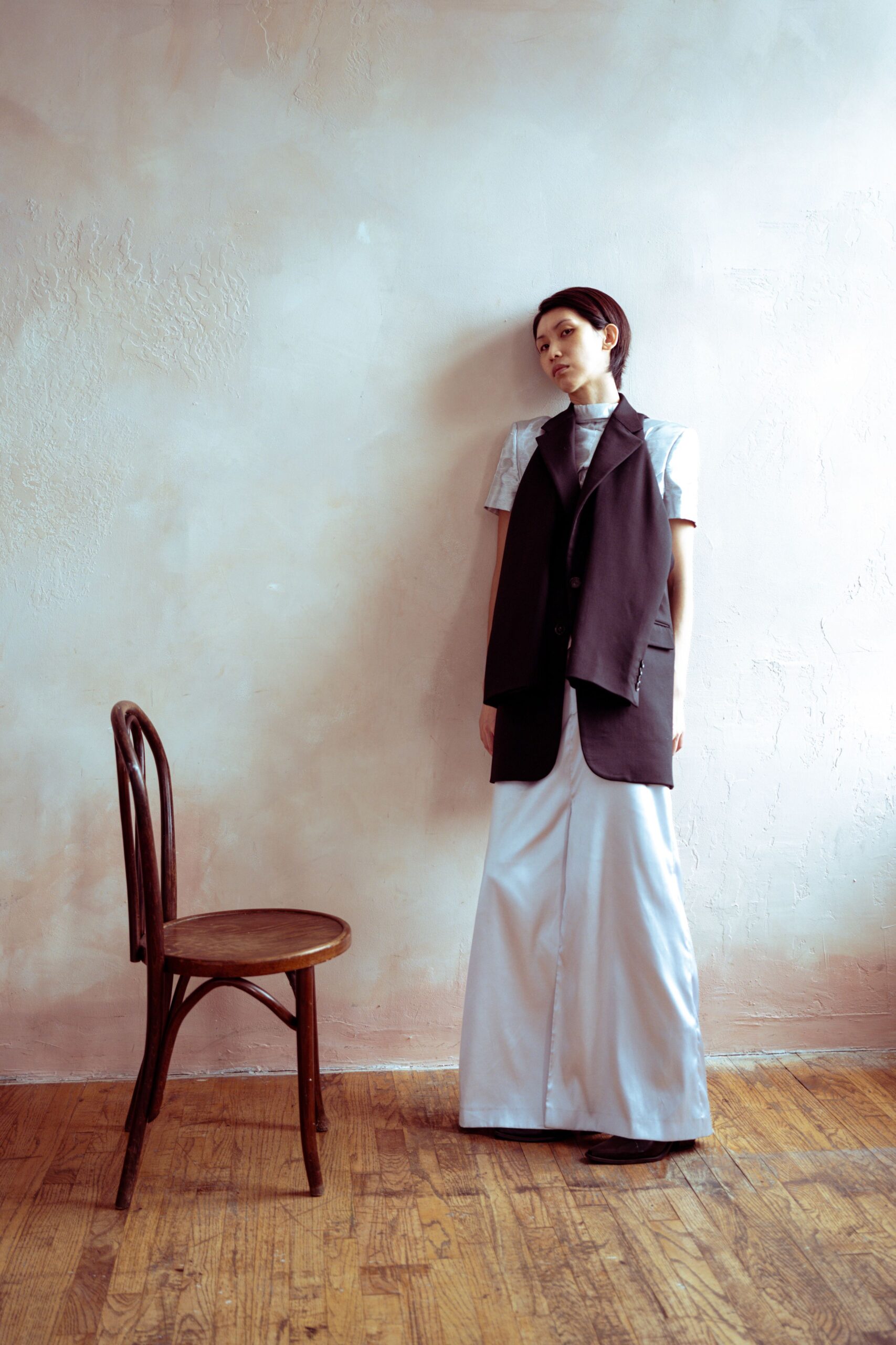 black vest white gown