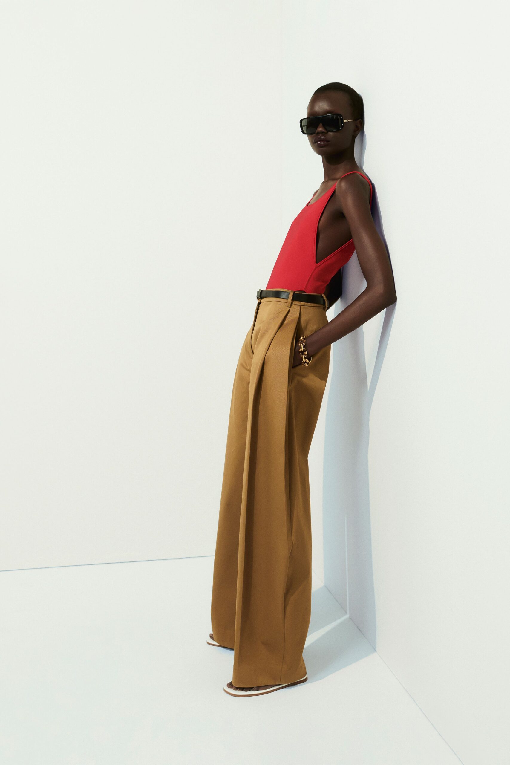 red fitted top with wide-leg pants