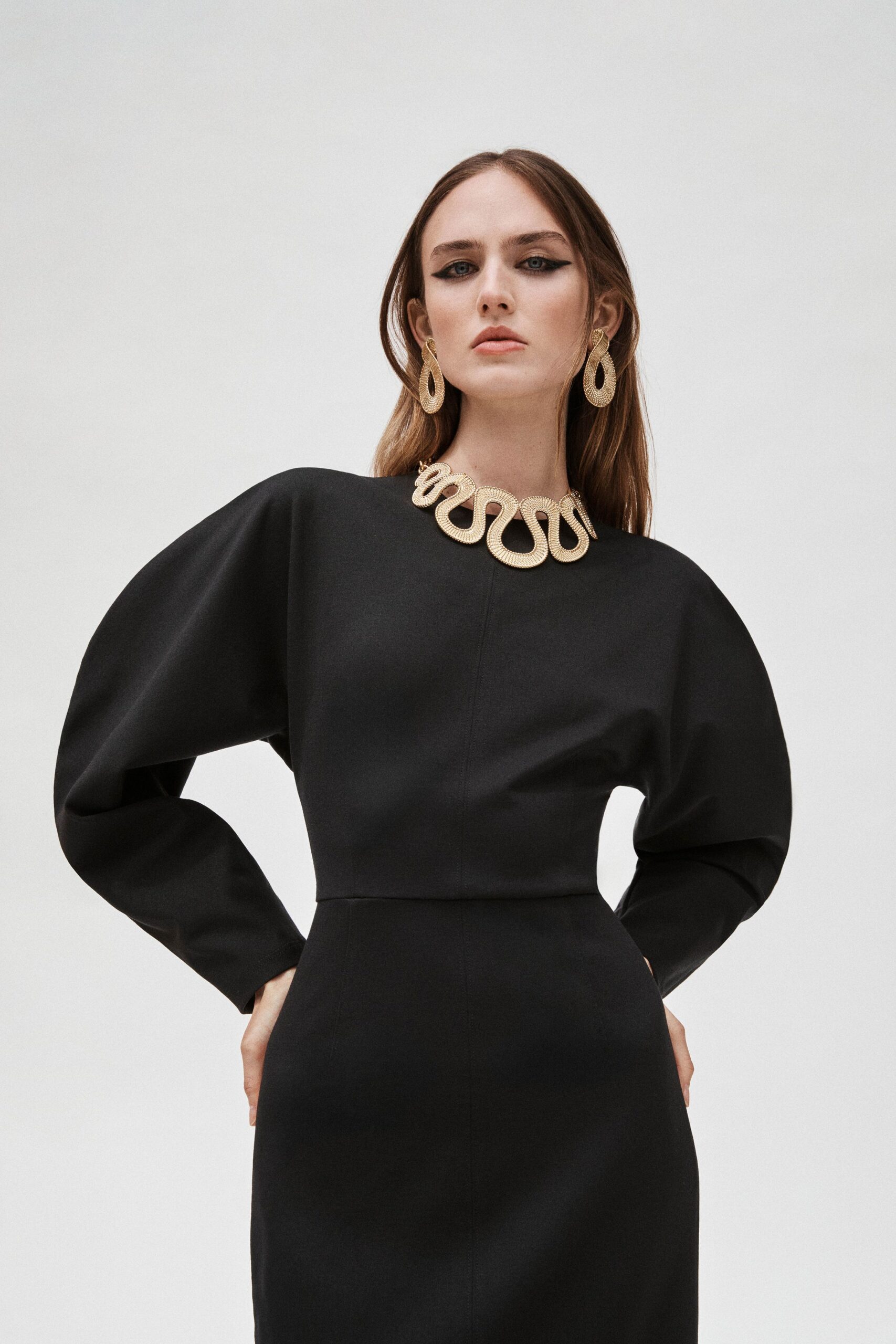 black fitted long-sleeve dress