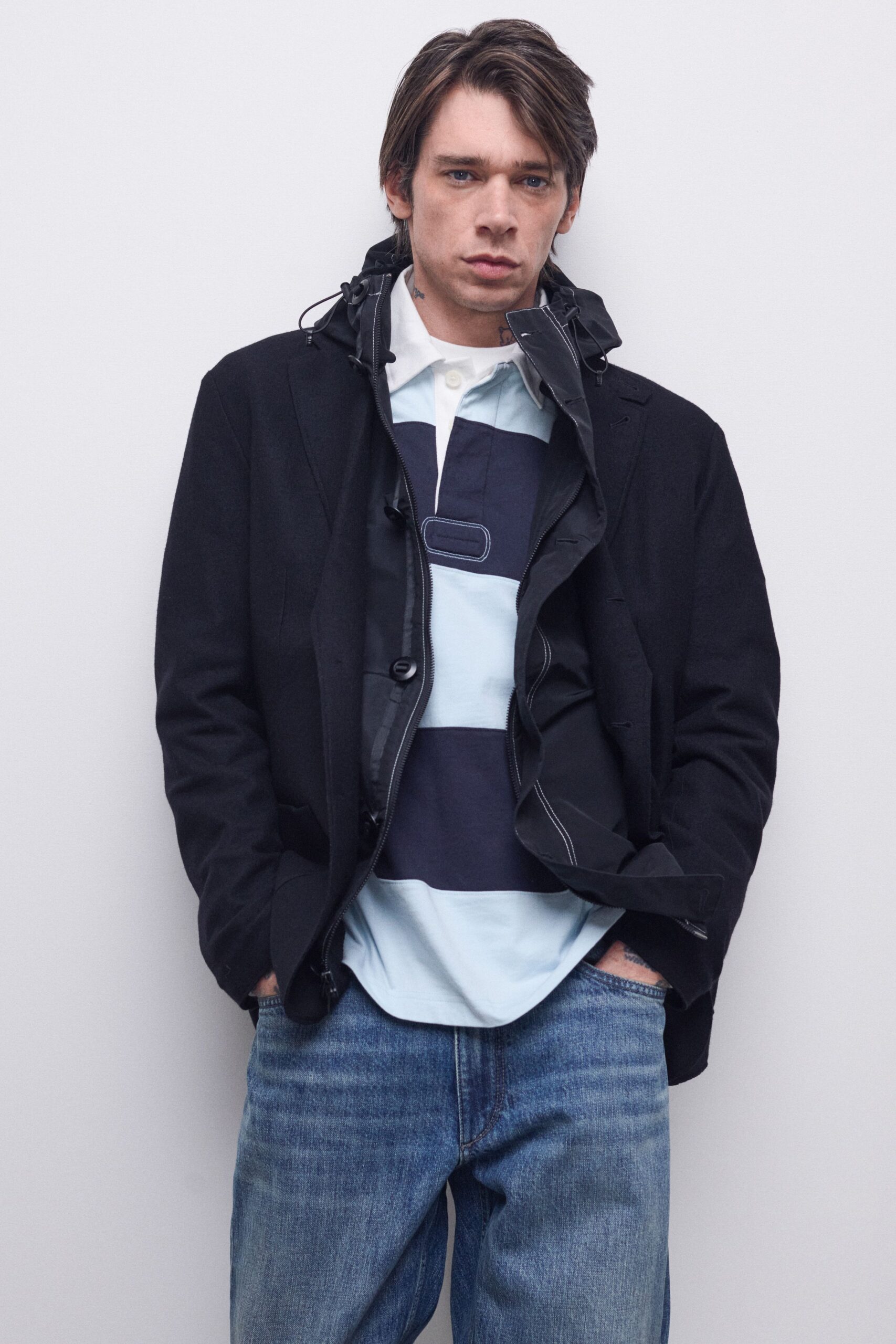 black jacket blue striped shirt