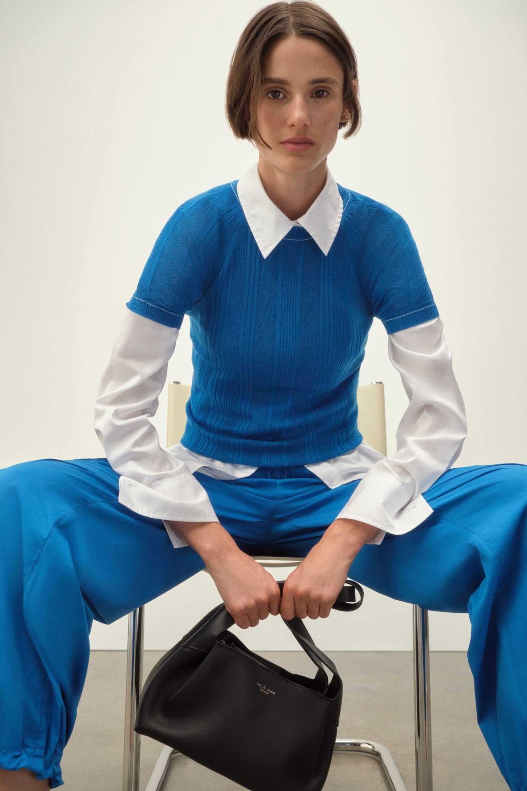 blue fitted top with relaxed pants
