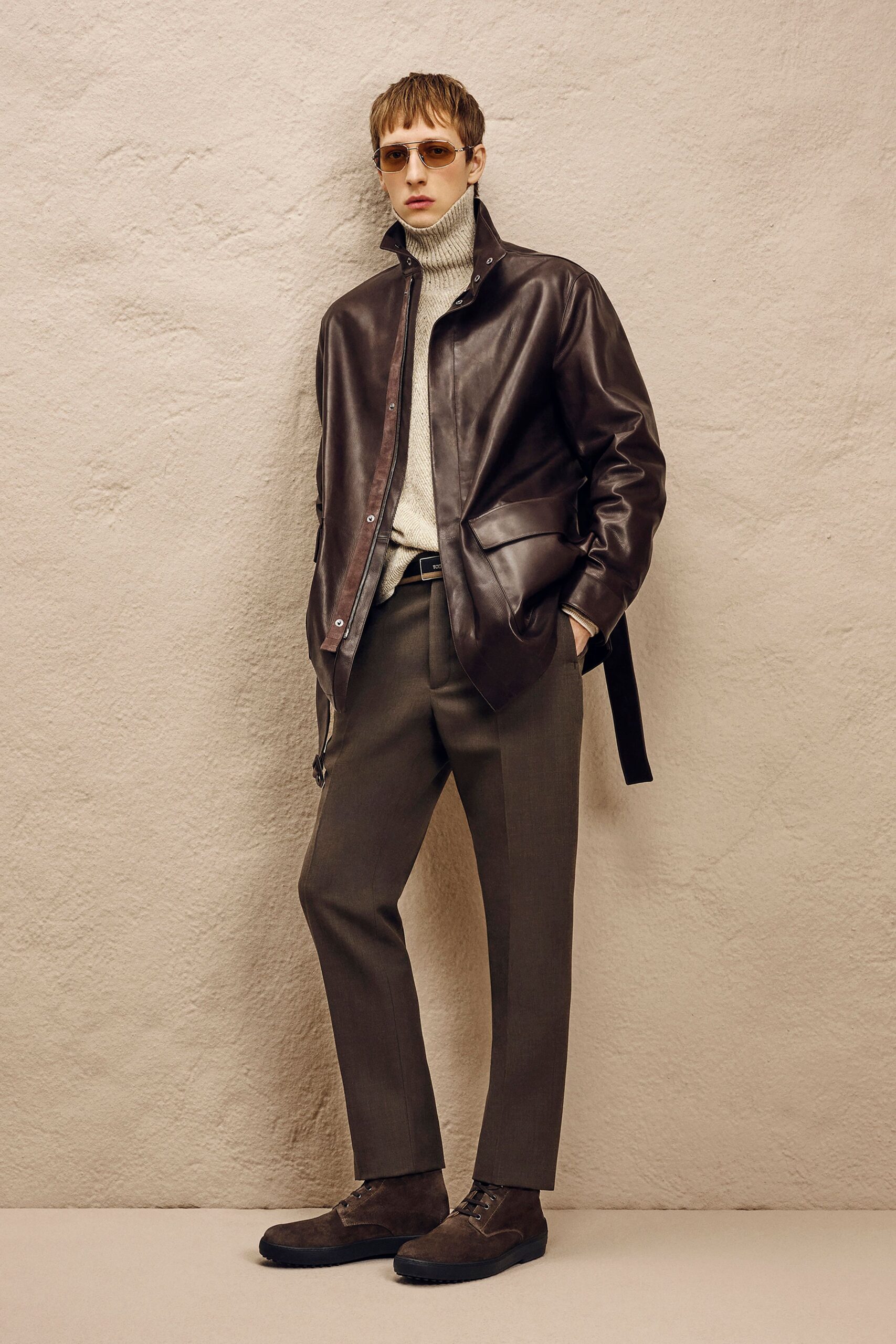 brown leather jacket with sweater