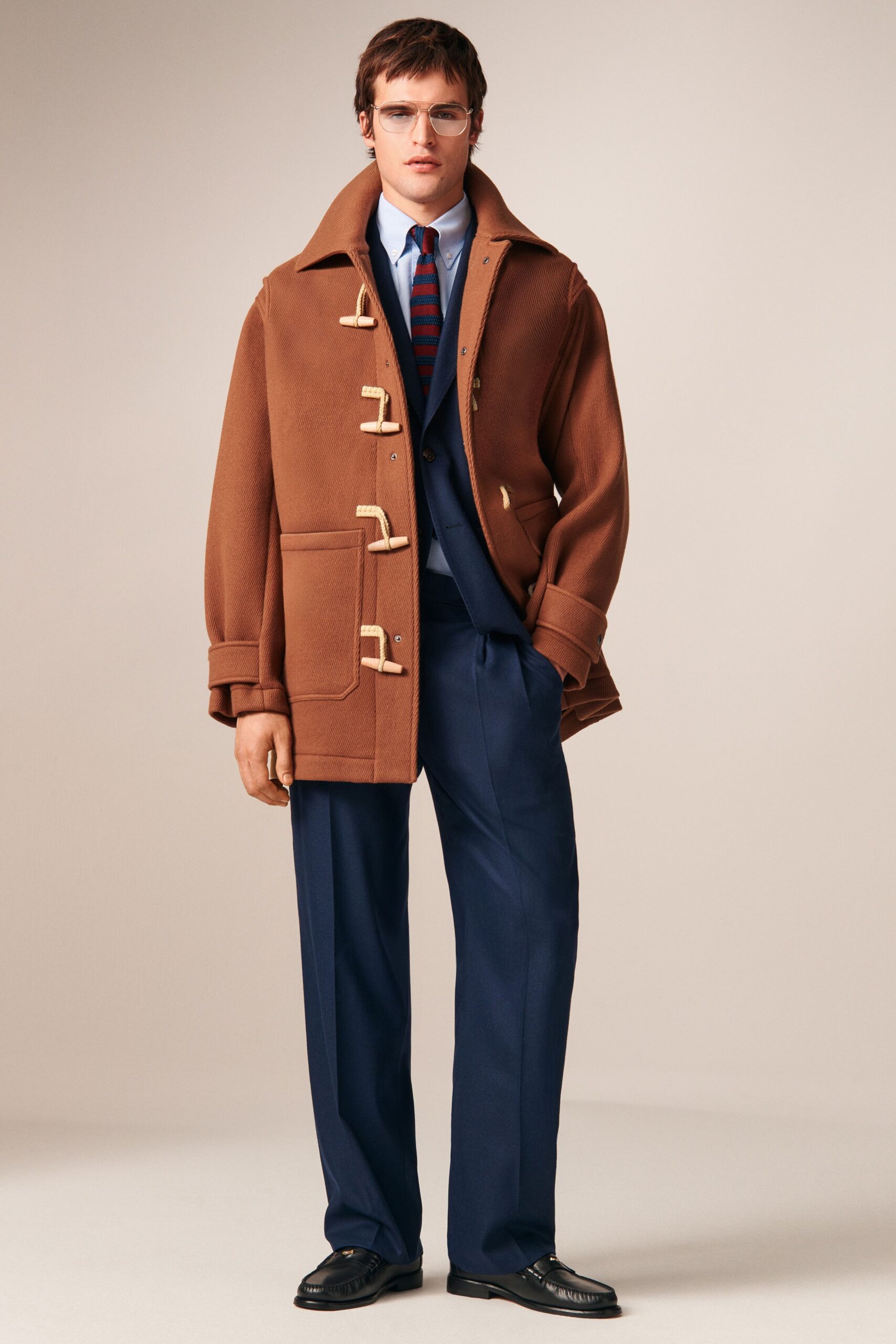 brown wool coat with blue suit