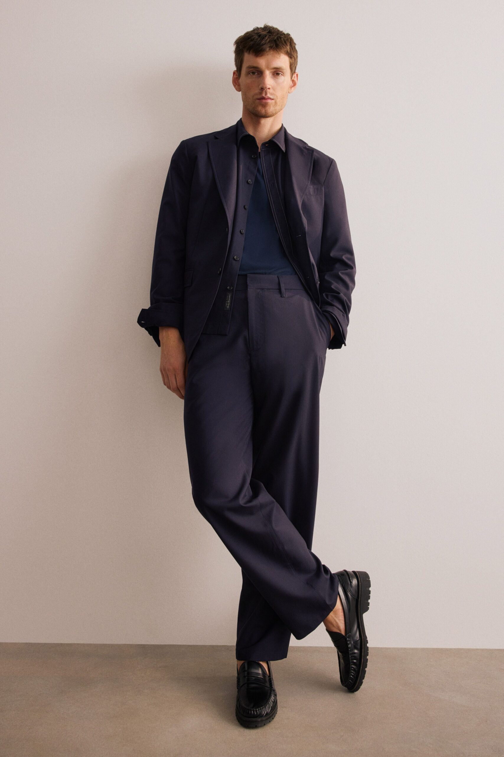 blue cotton relaxed high-waisted pleated pants