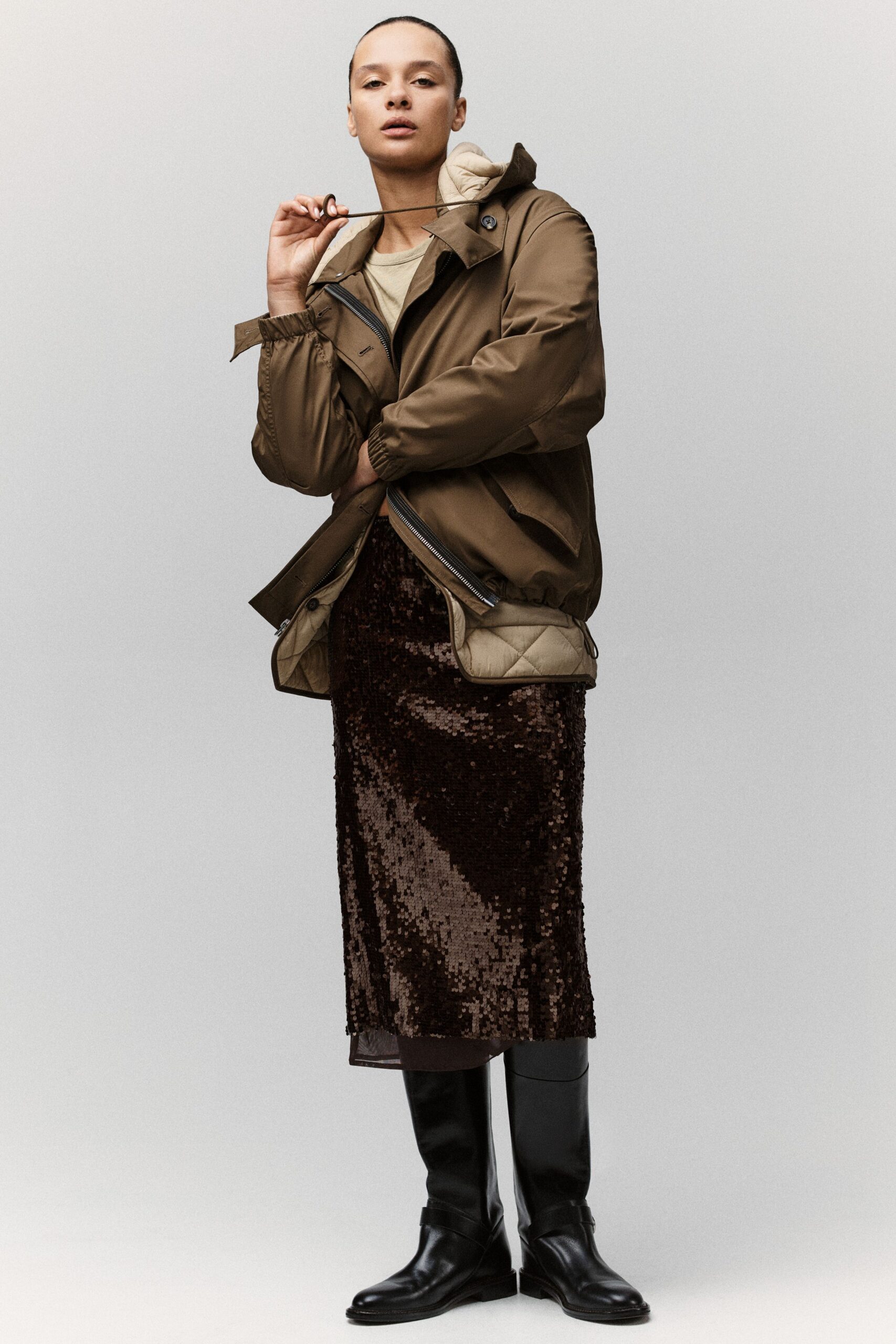 brown jacket beige top sequin skirt