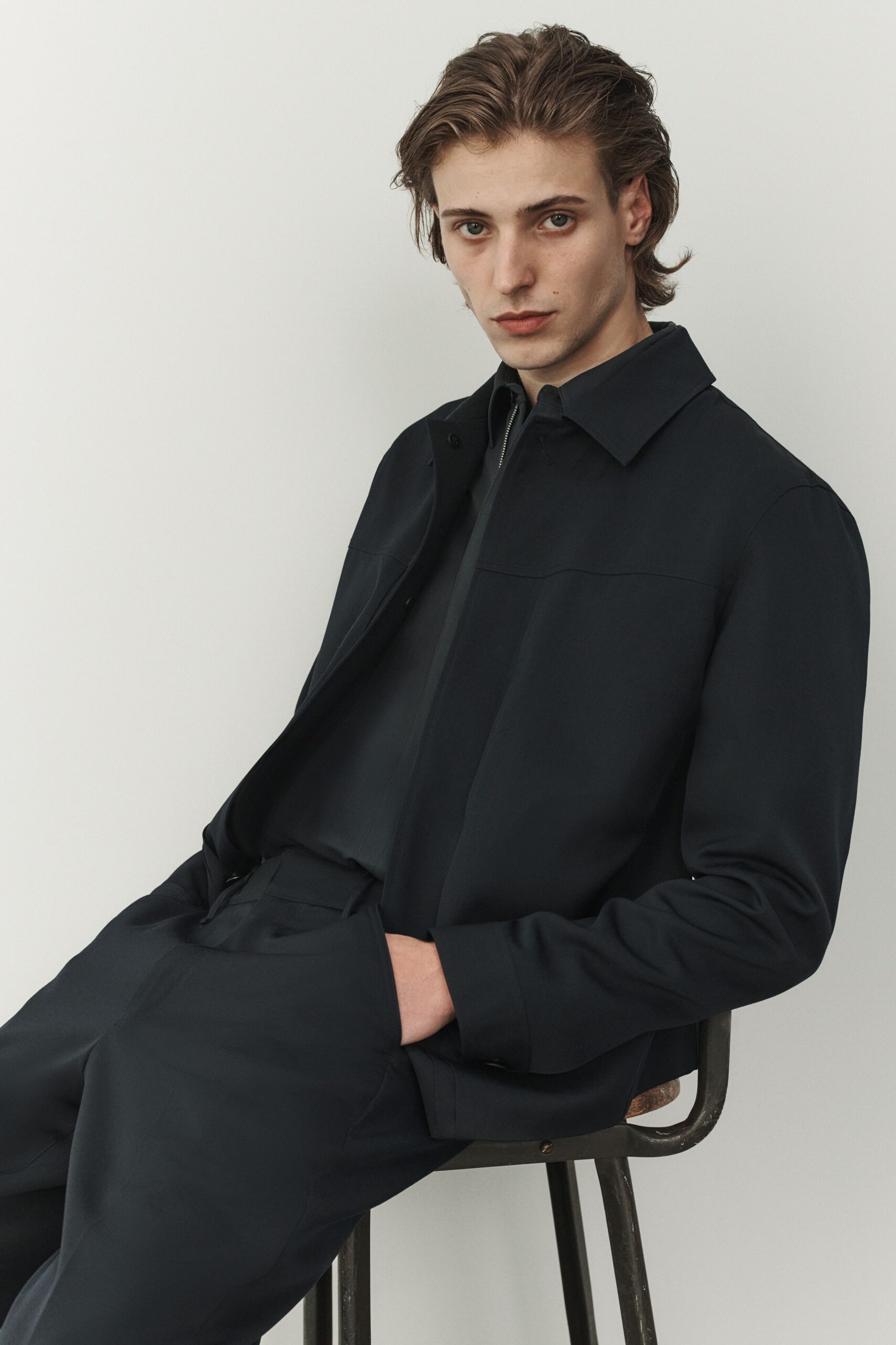 black fitted jacket and pants