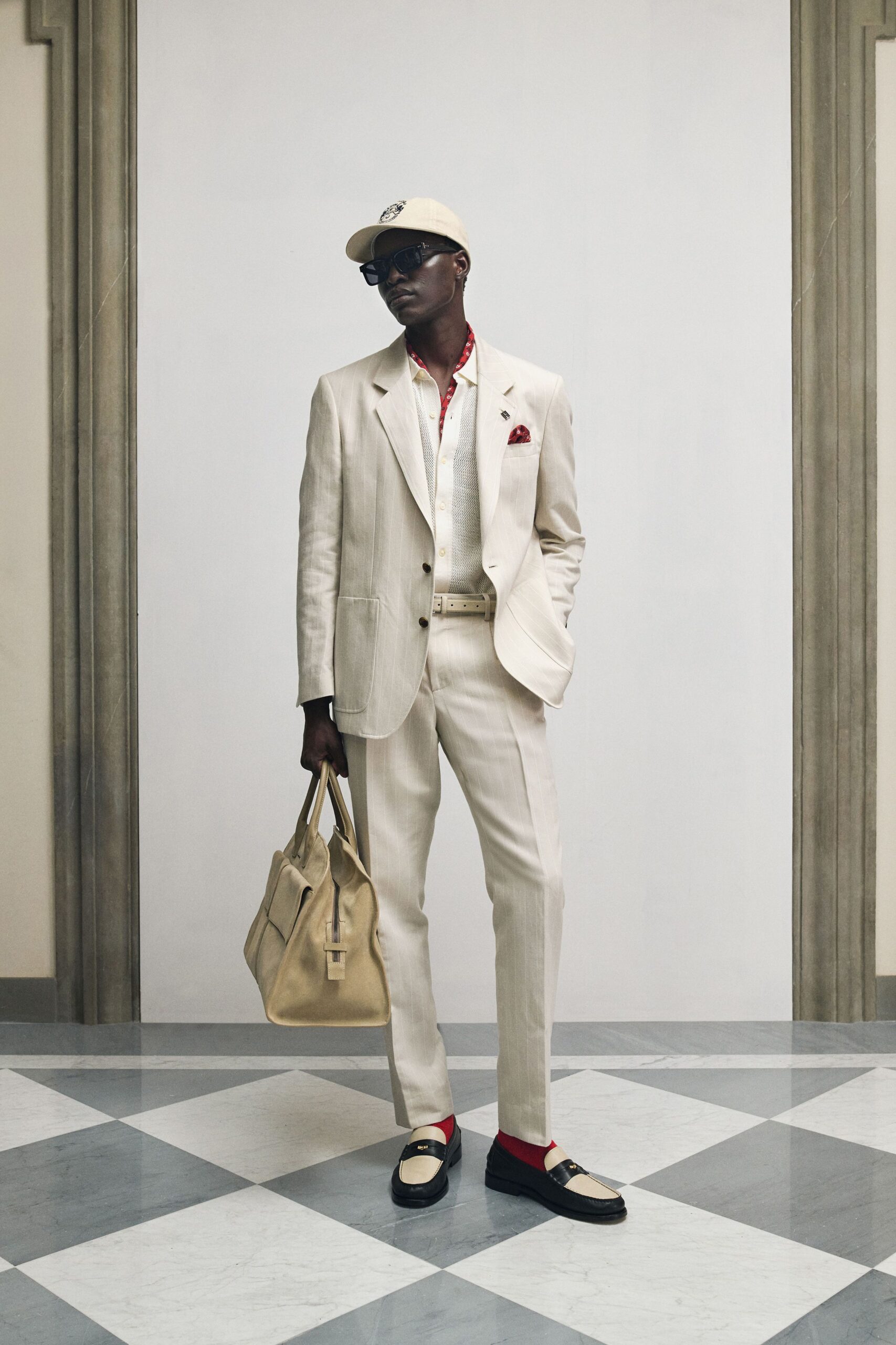 beige tailored suit with cap