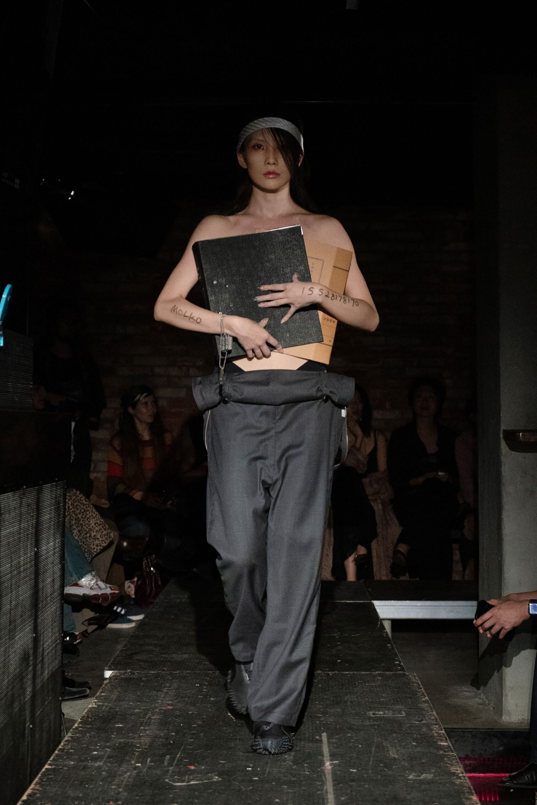 gray relaxed pants and nude top