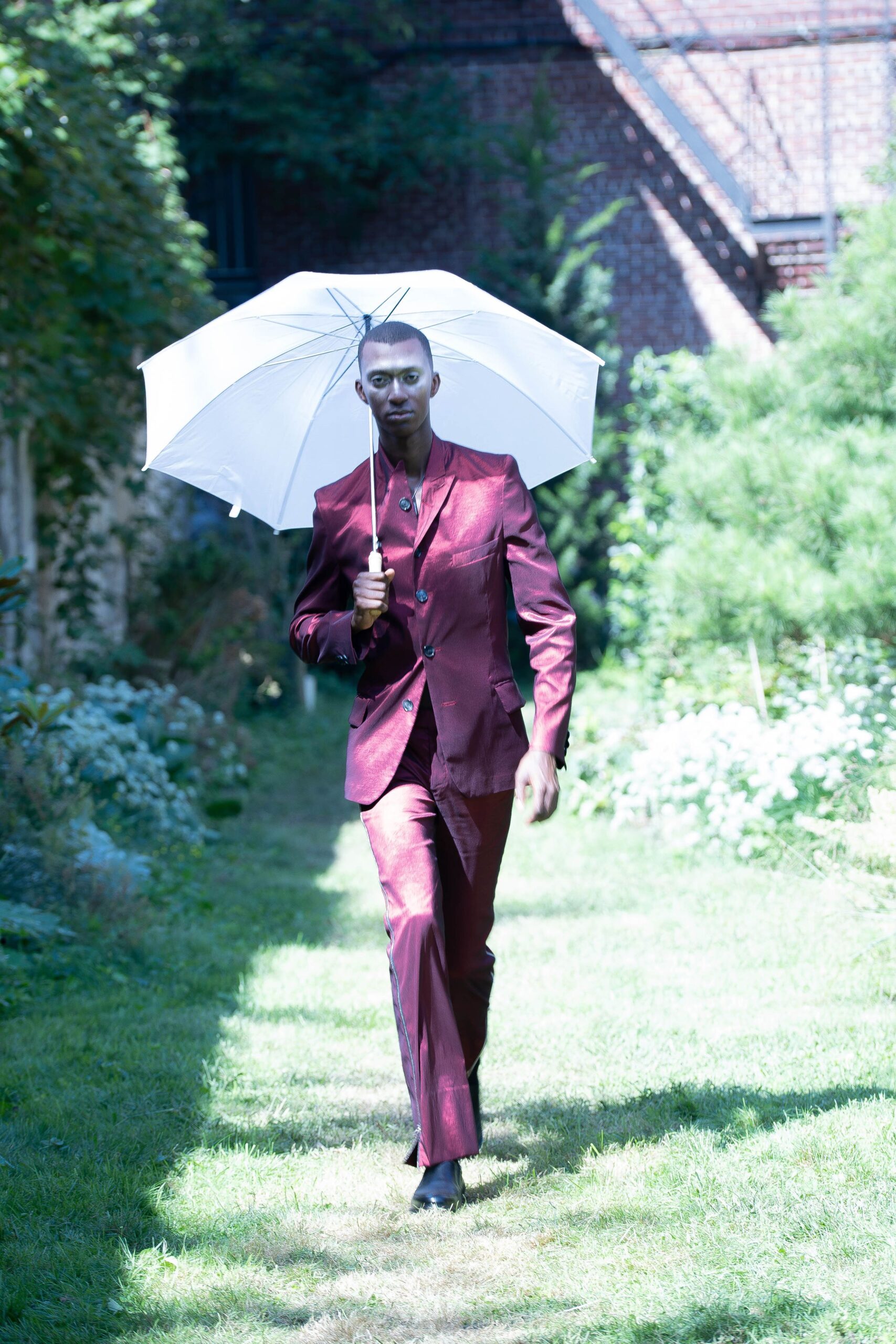 red silk long-sleeve collared tailored buttoned shiny suit