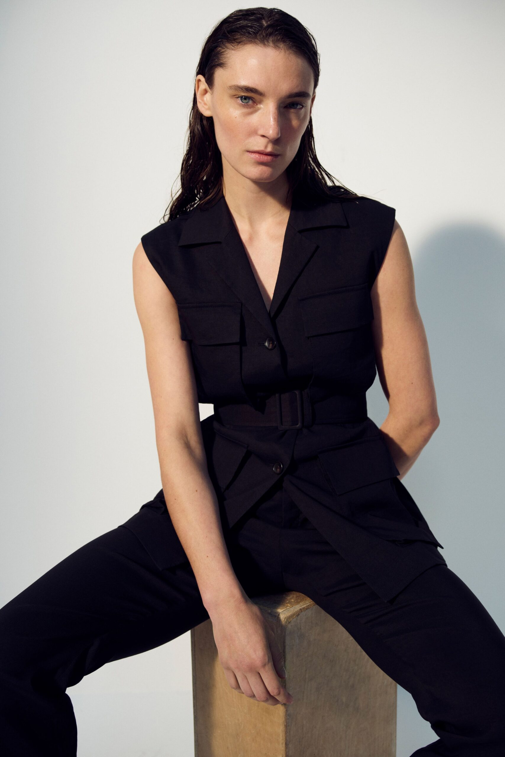 black fitted sleeveless jumpsuit