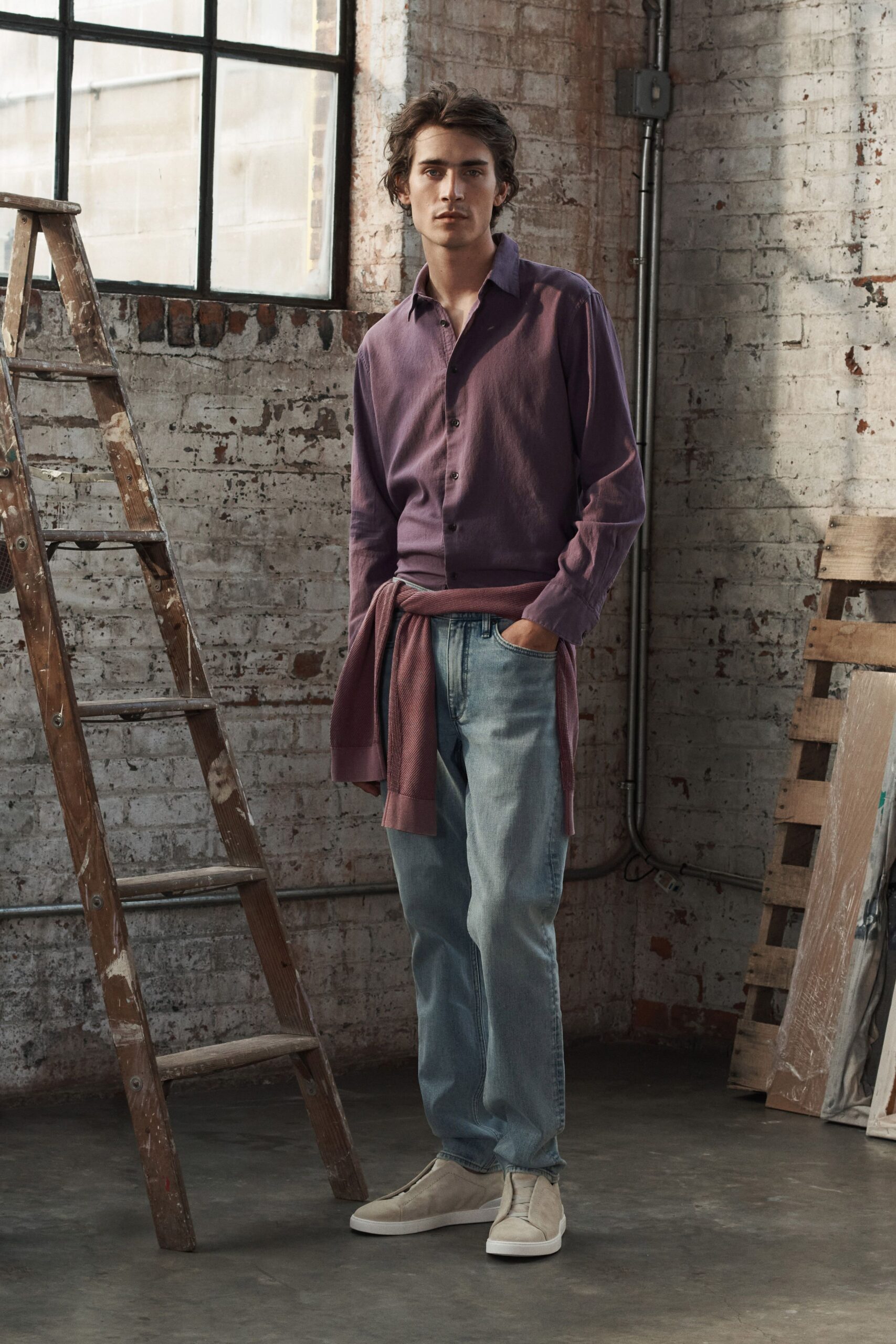 purple shirt with relaxed jeans