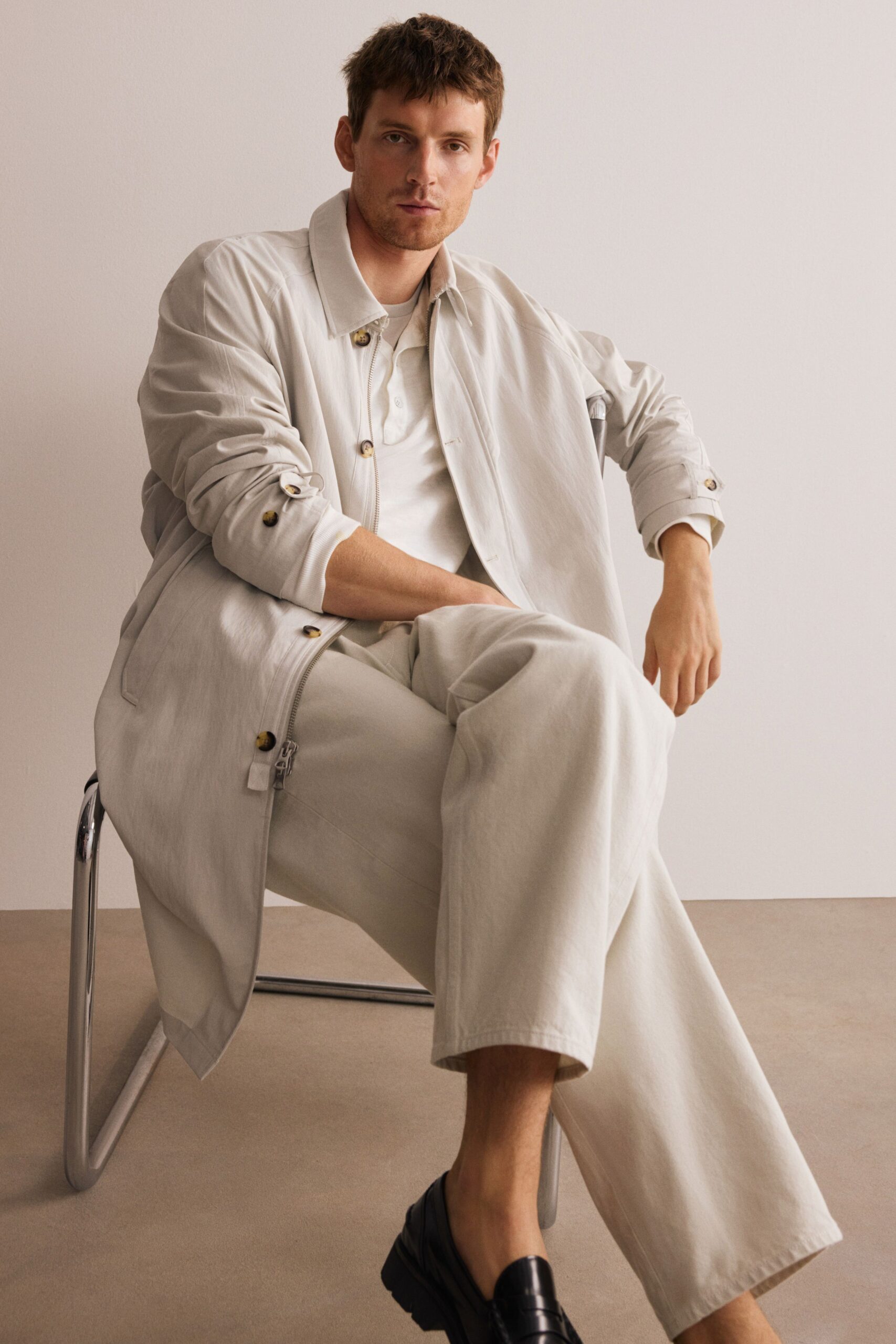 white relaxed jacket with black shoes