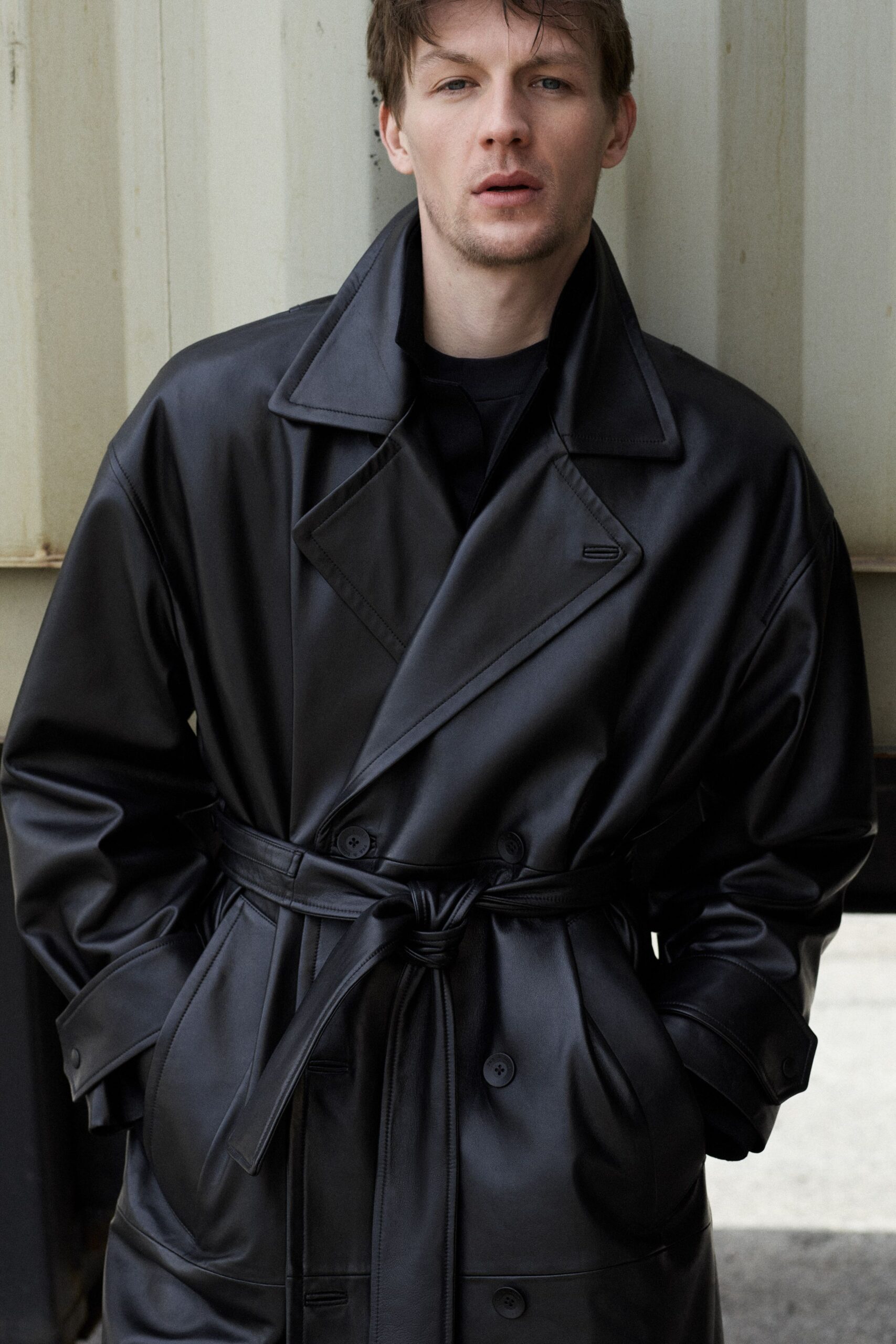 black leather belted coat