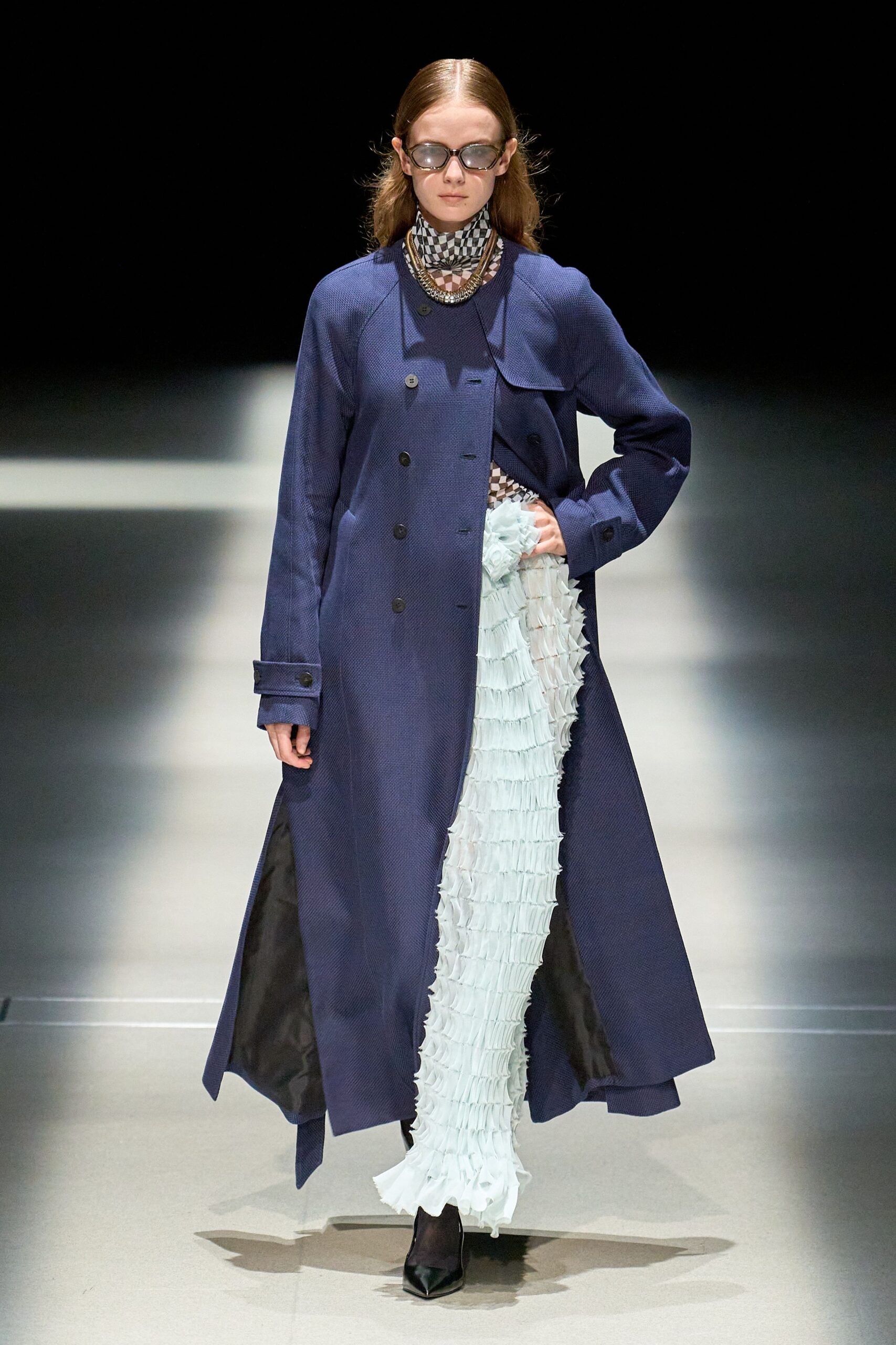 blue coat with pleated pants