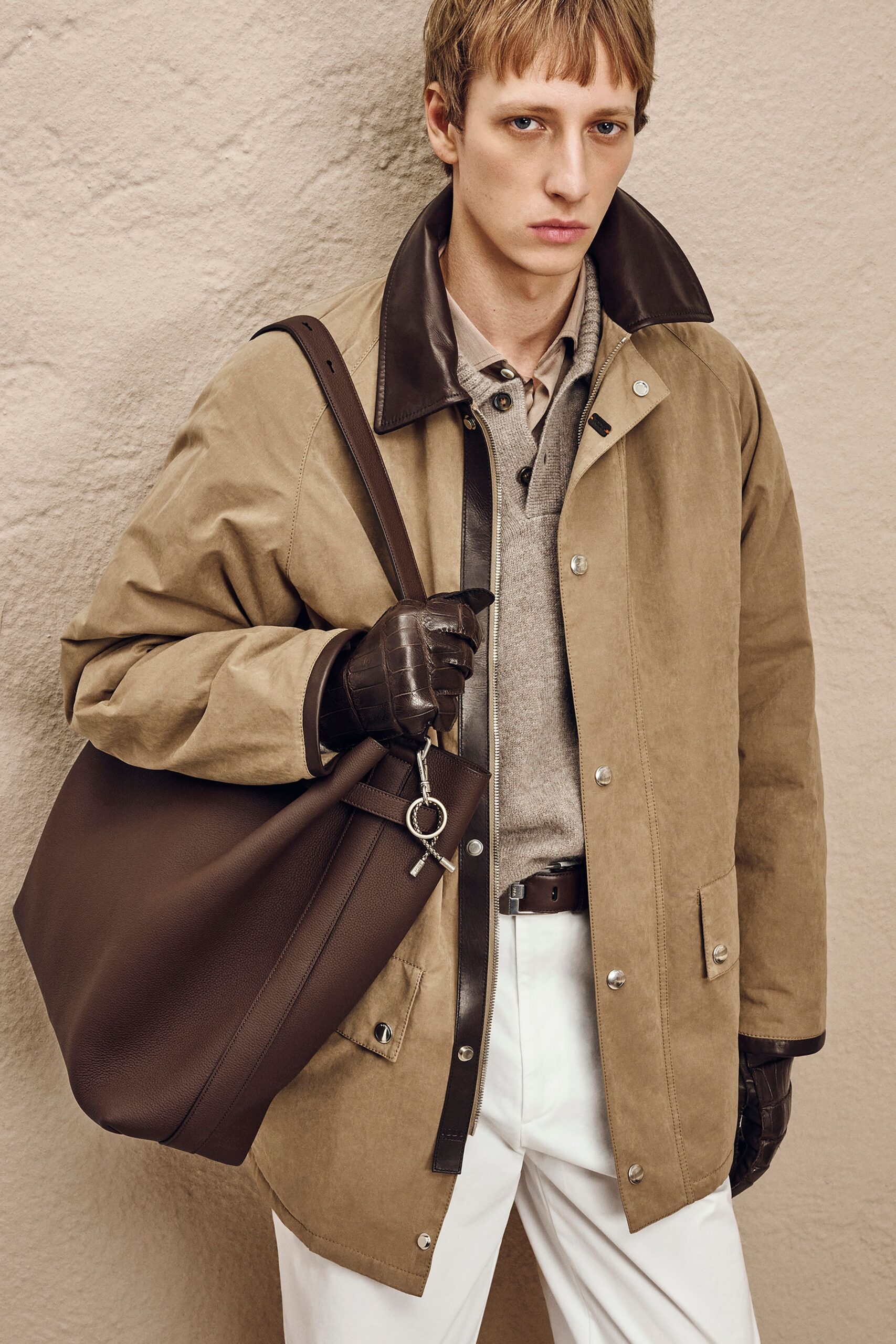 beige jacket gray shirt white pants
