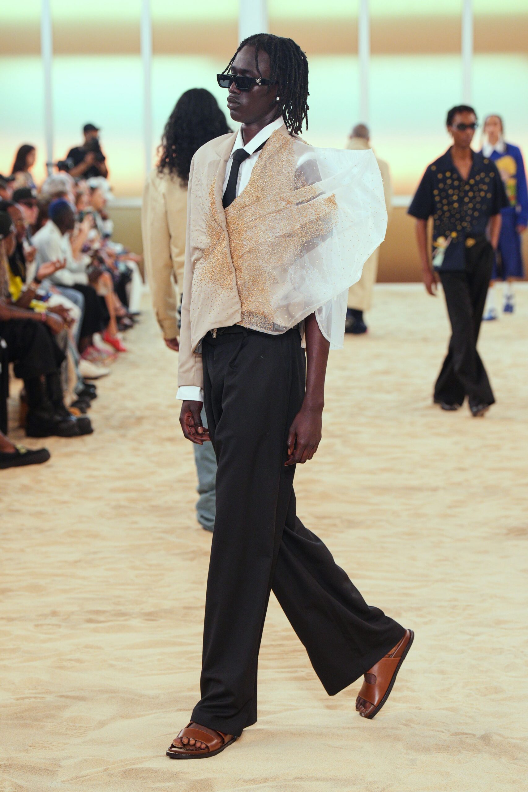 white shirt gold vest black pants