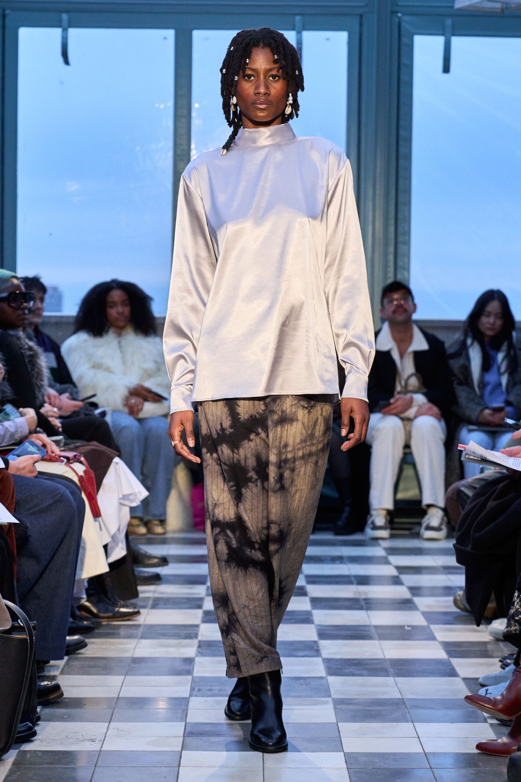 silver satin relaxed top with gray tie-dye pants