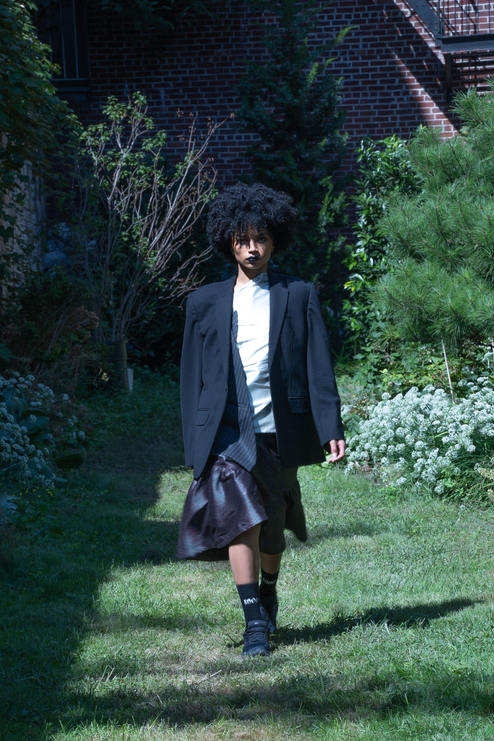 black blazer white shirt brown pleated skirt
