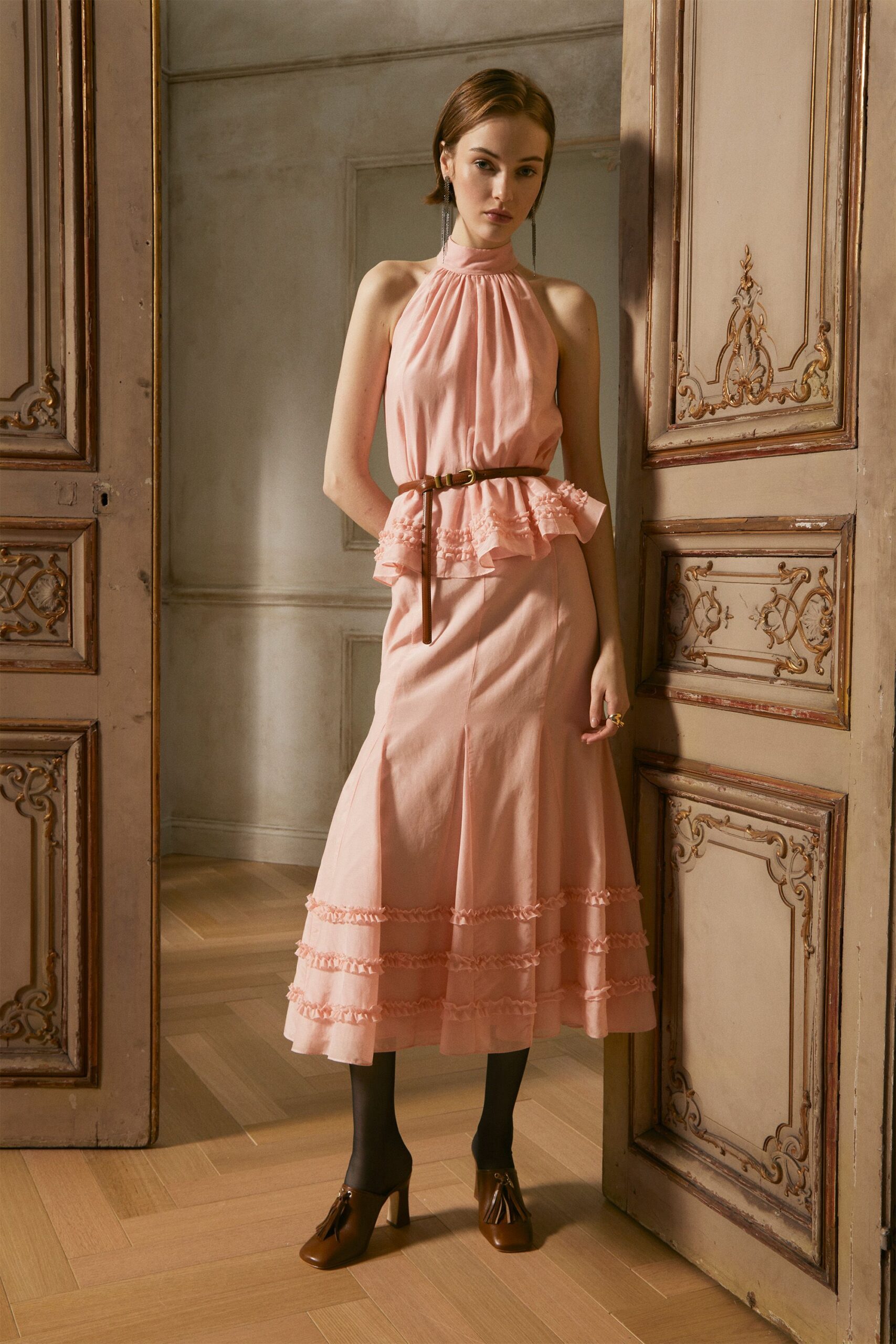 pink ruffled top and skirt