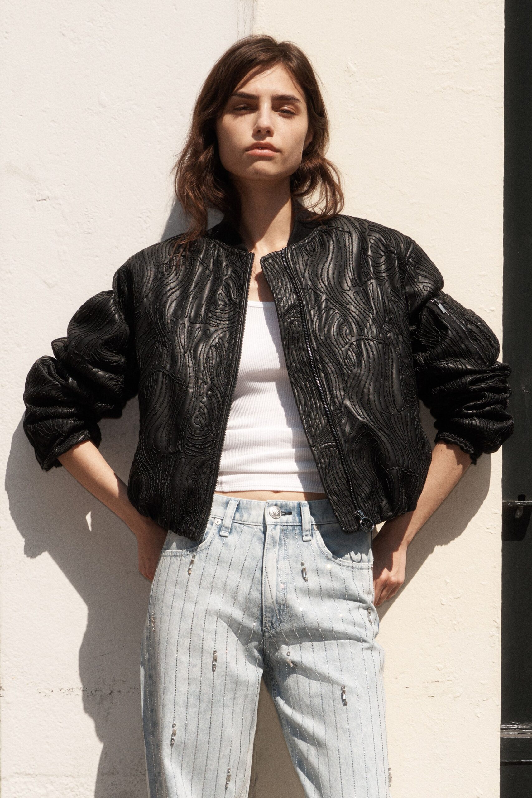 black leather long-sleeve collared relaxed textured jacket