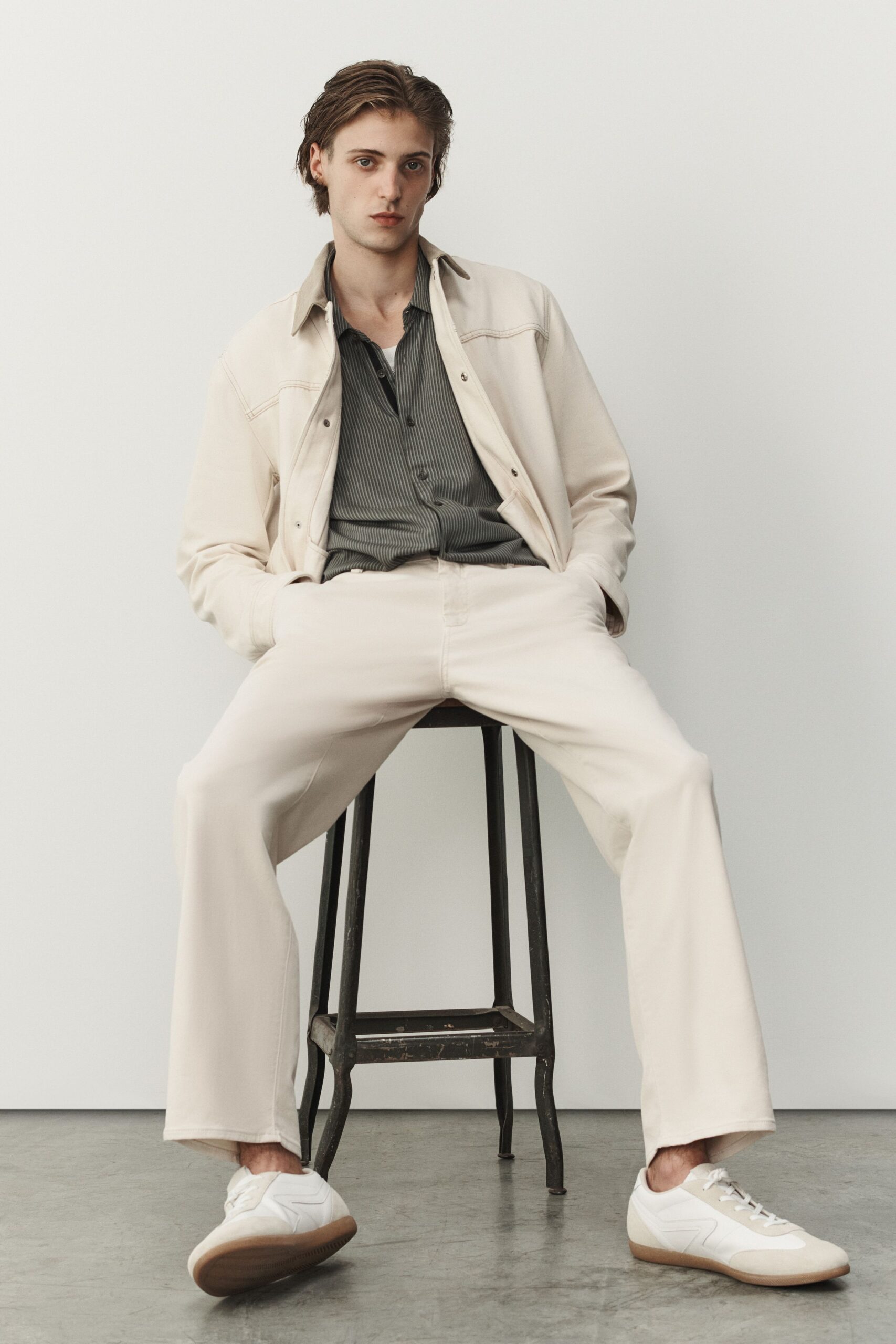 white relaxed jacket with striped shirt