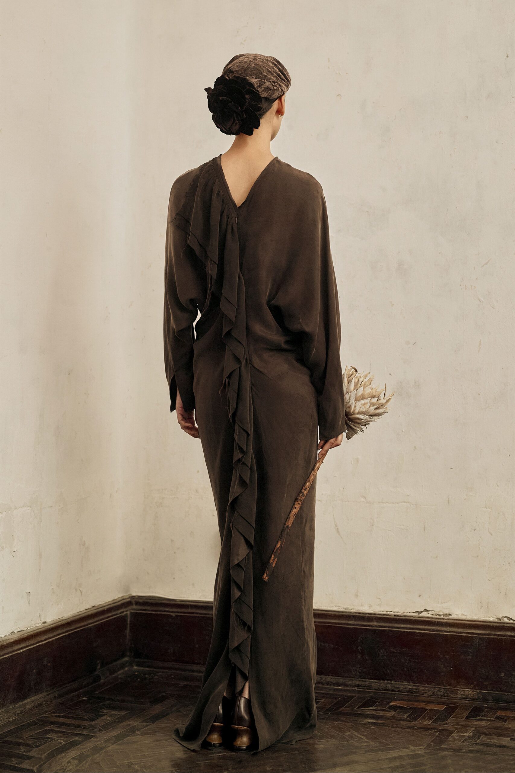 brown cotton long-sleeve v-neck fitted ruffled maxi gown
