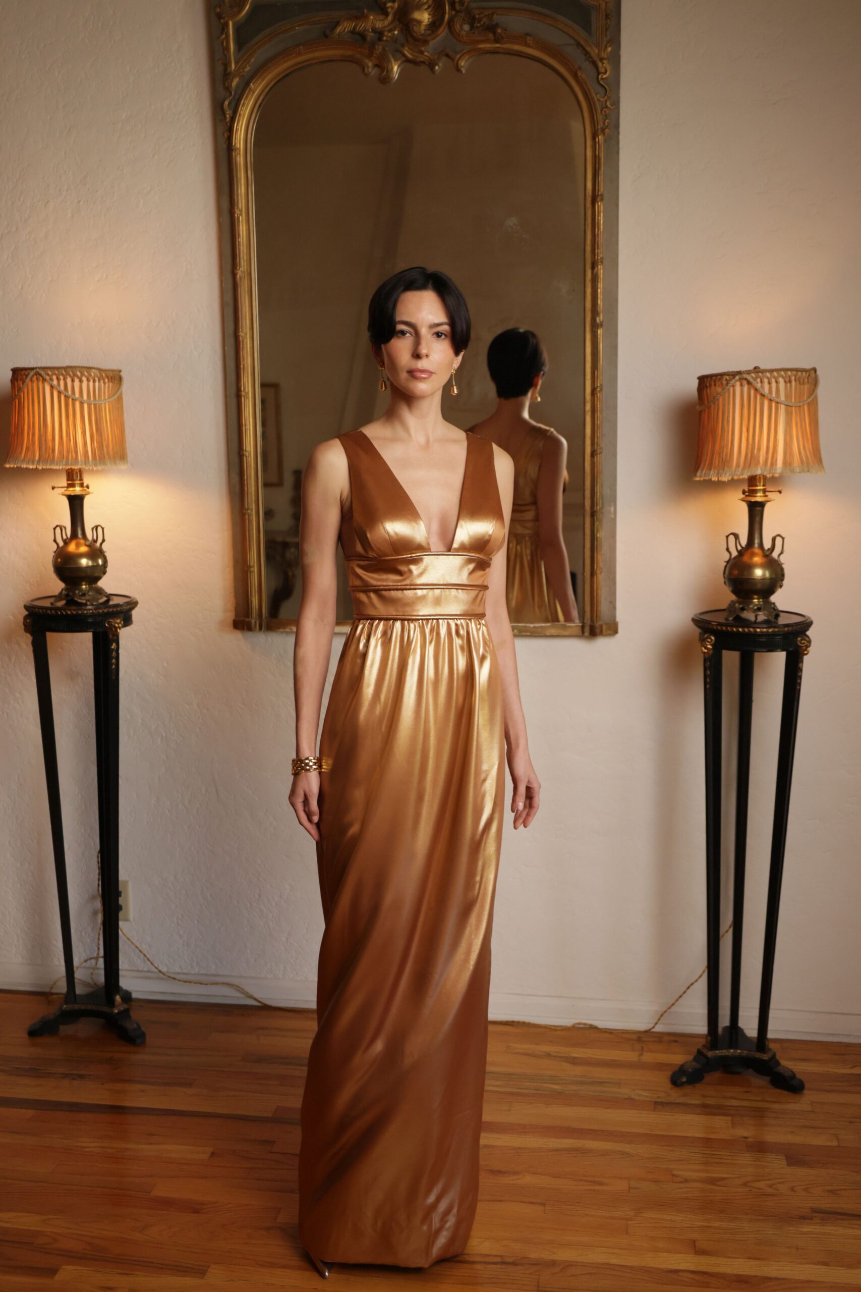 gold satin sleeveless gown