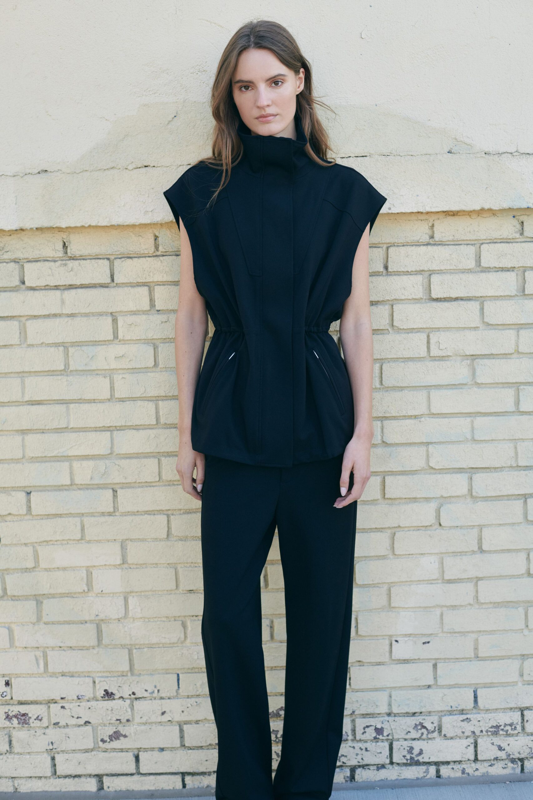 black fitted top and relaxed pants
