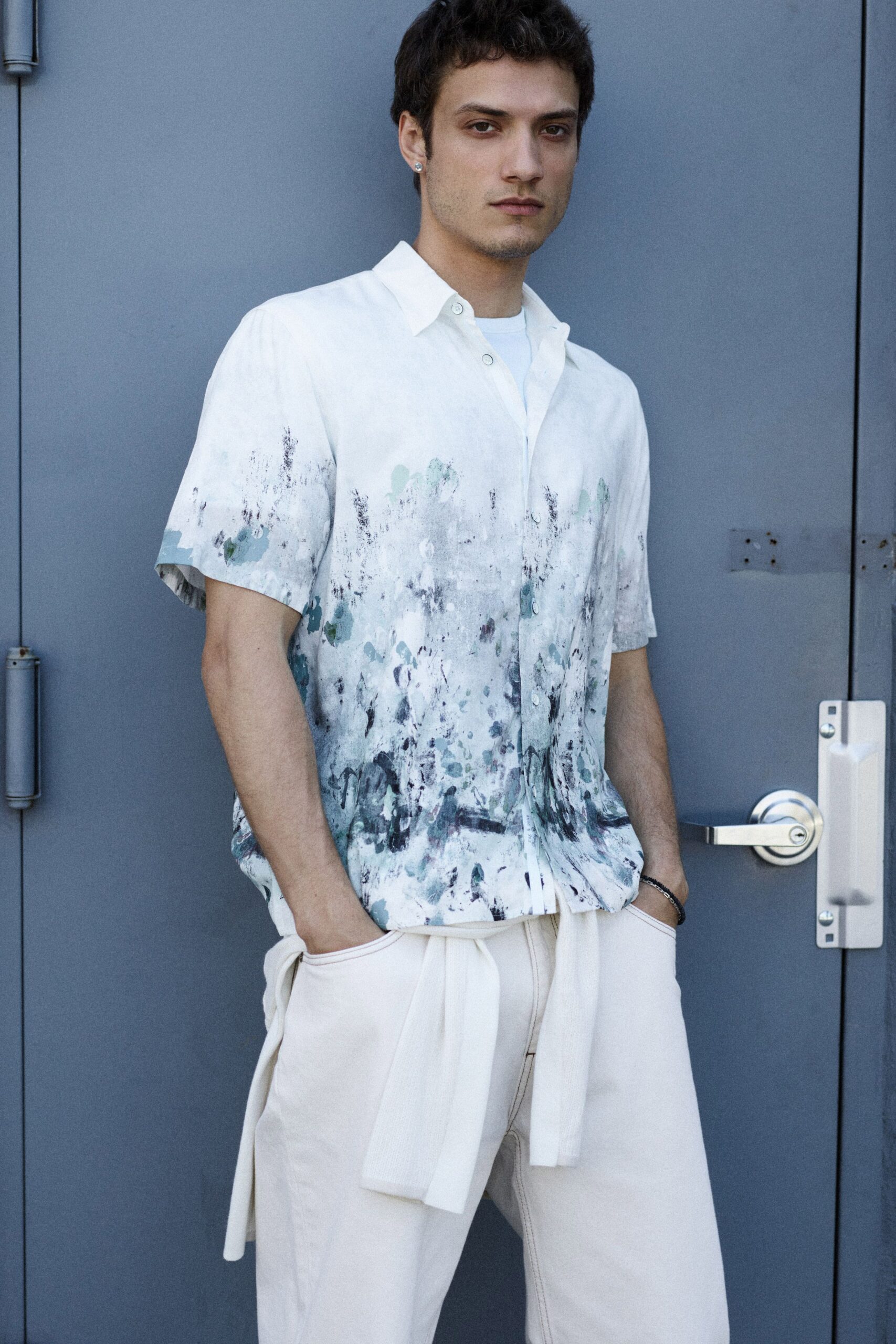 relaxed printed shirt and beige pants