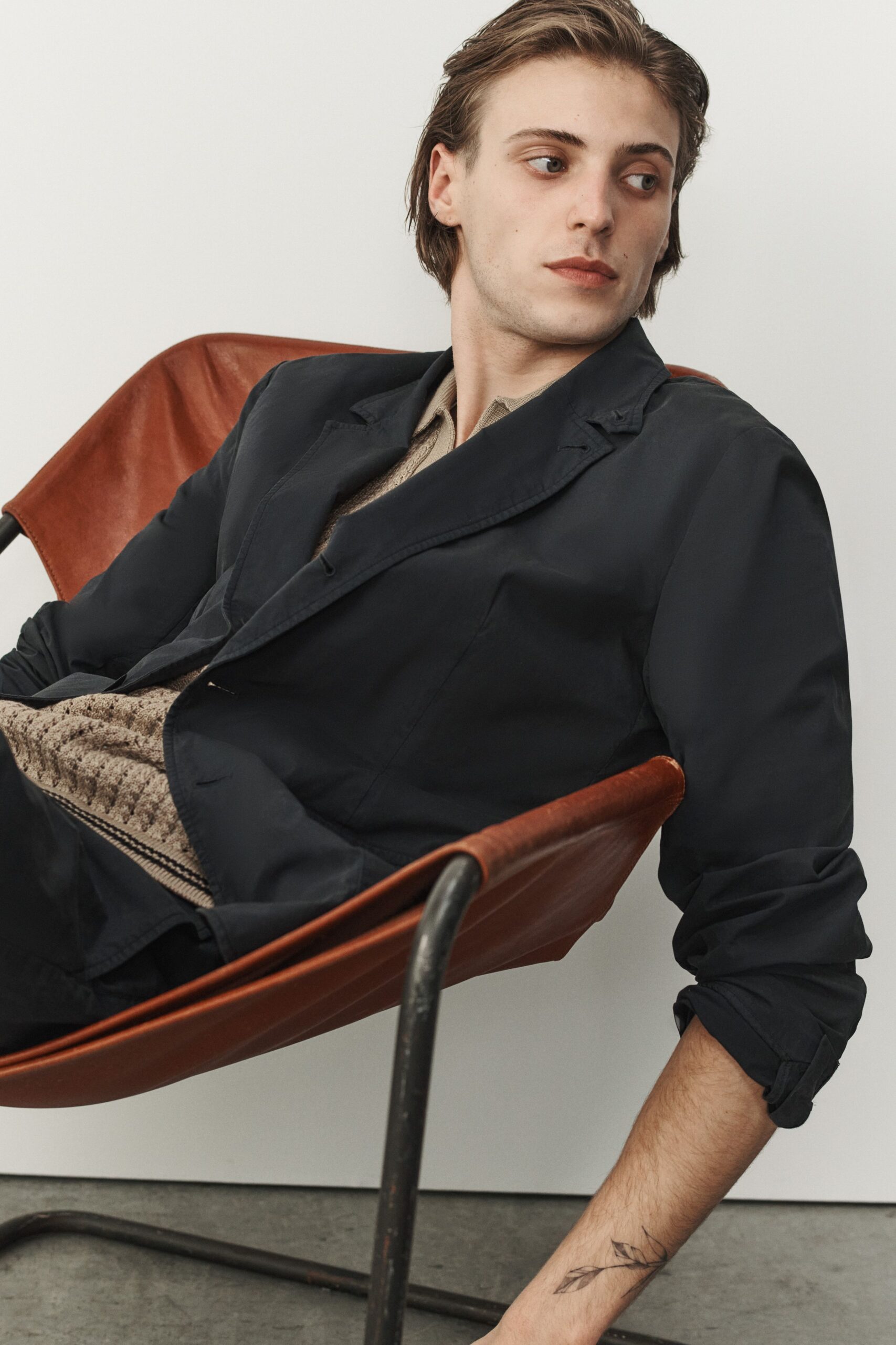 black blazer and beige shirt