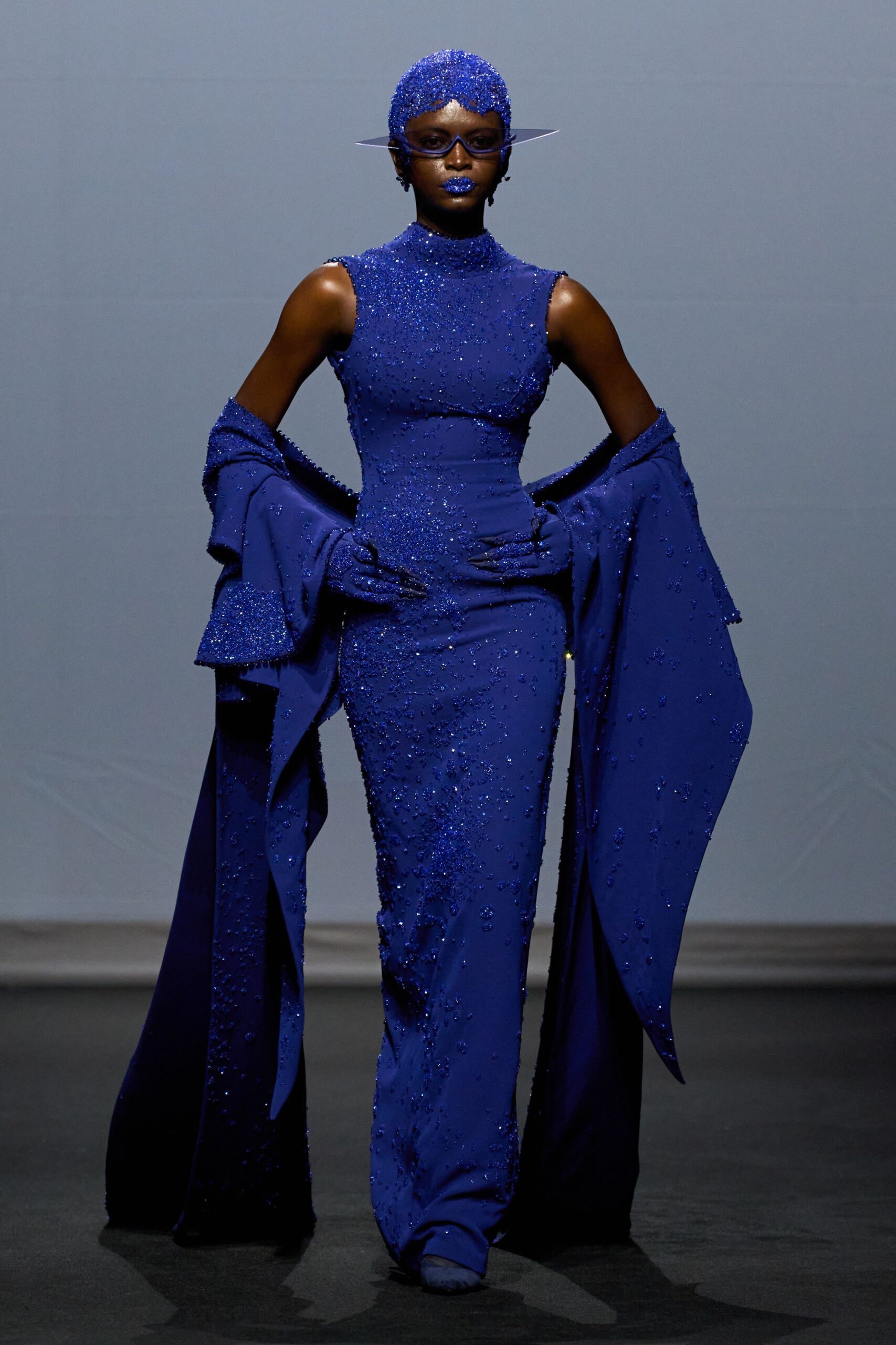 blue beaded long-sleeve gown