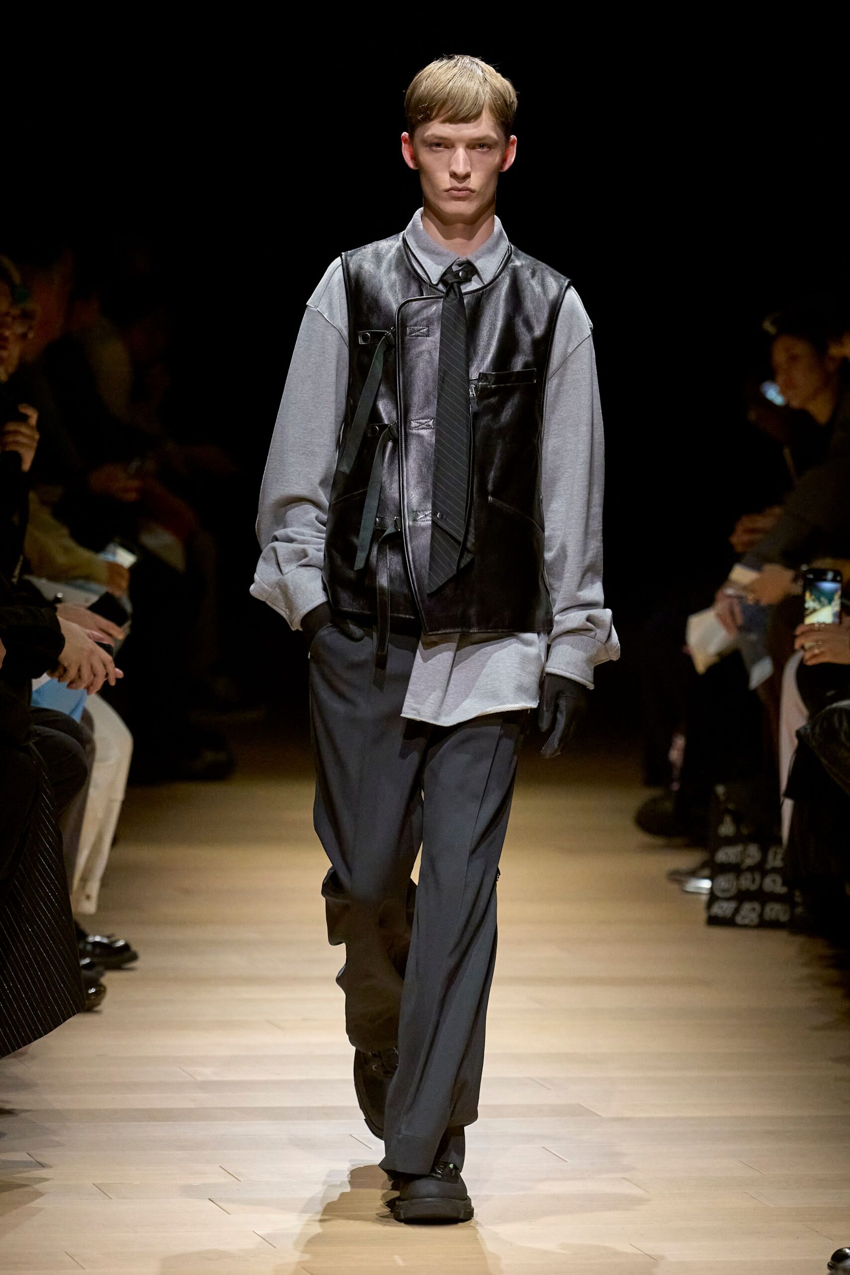 black leather vest with gray shirt