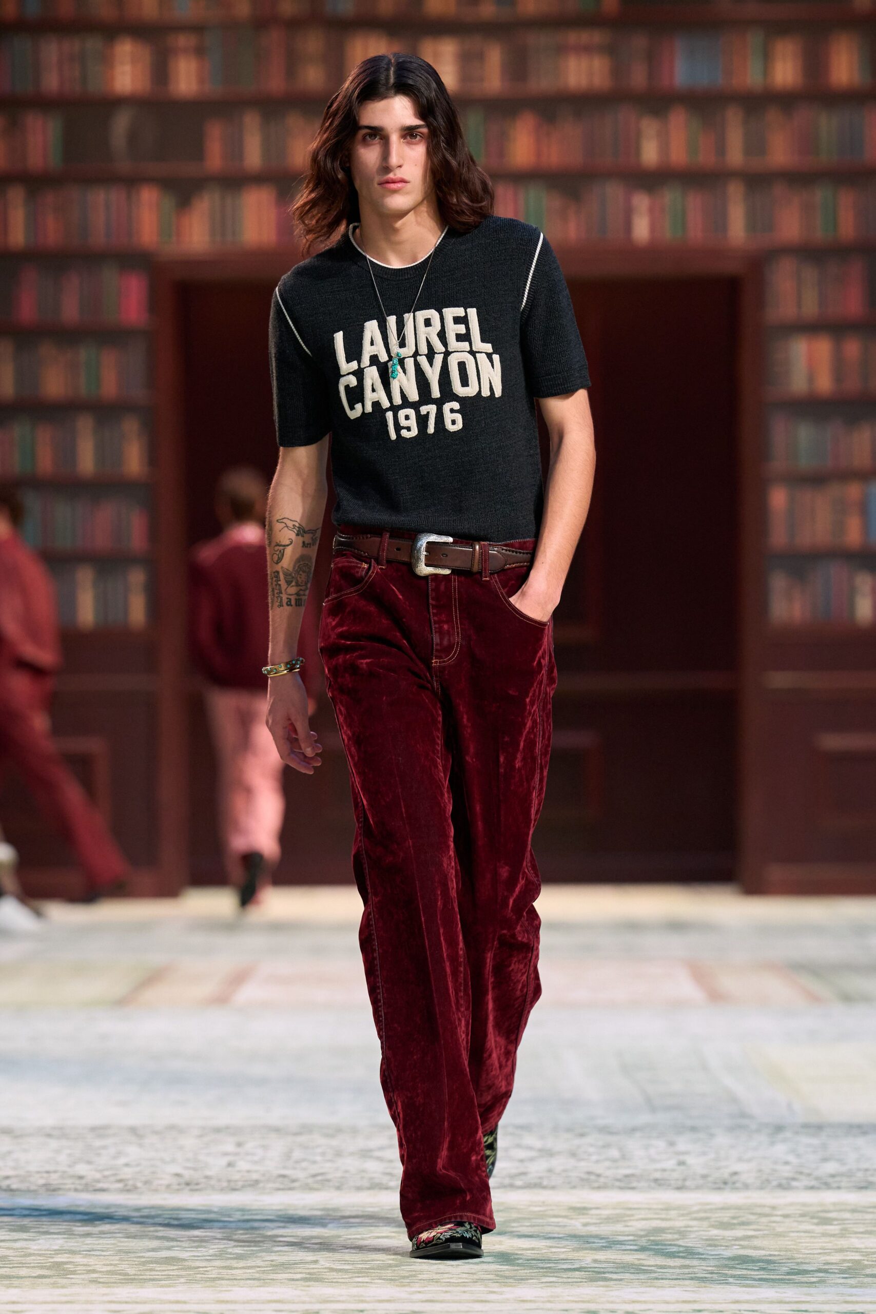black t-shirt with red velvet pants
