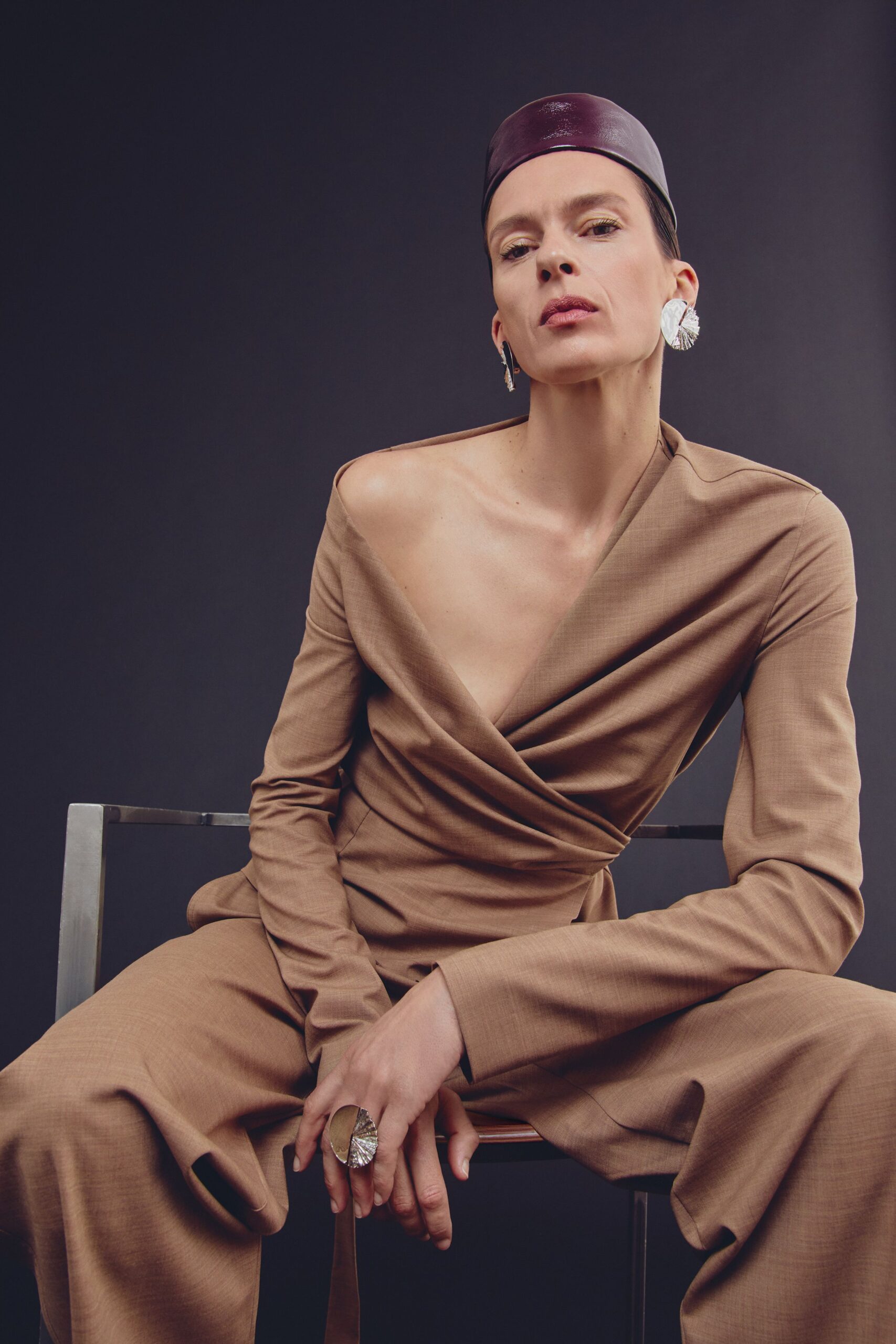 brown cotton long-sleeve v-neck fitted draped jumpsuit