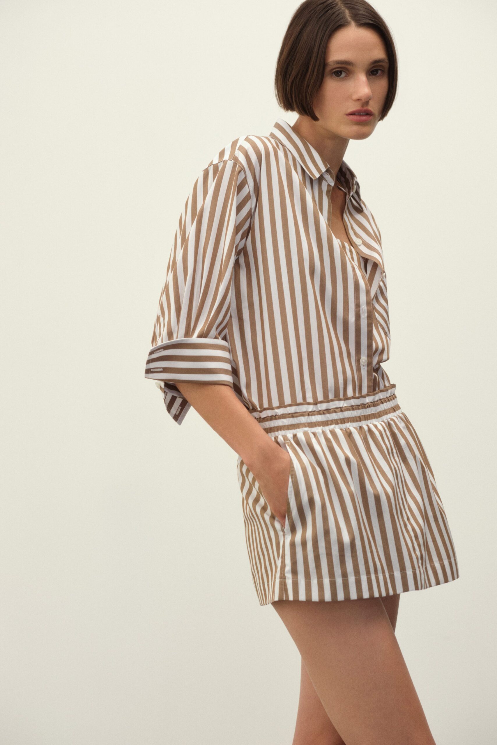 striped brown and white shirt and shorts
