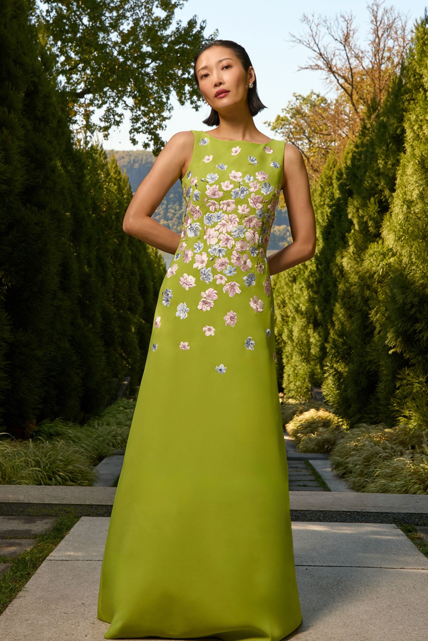 green embroidered sleeveless gown