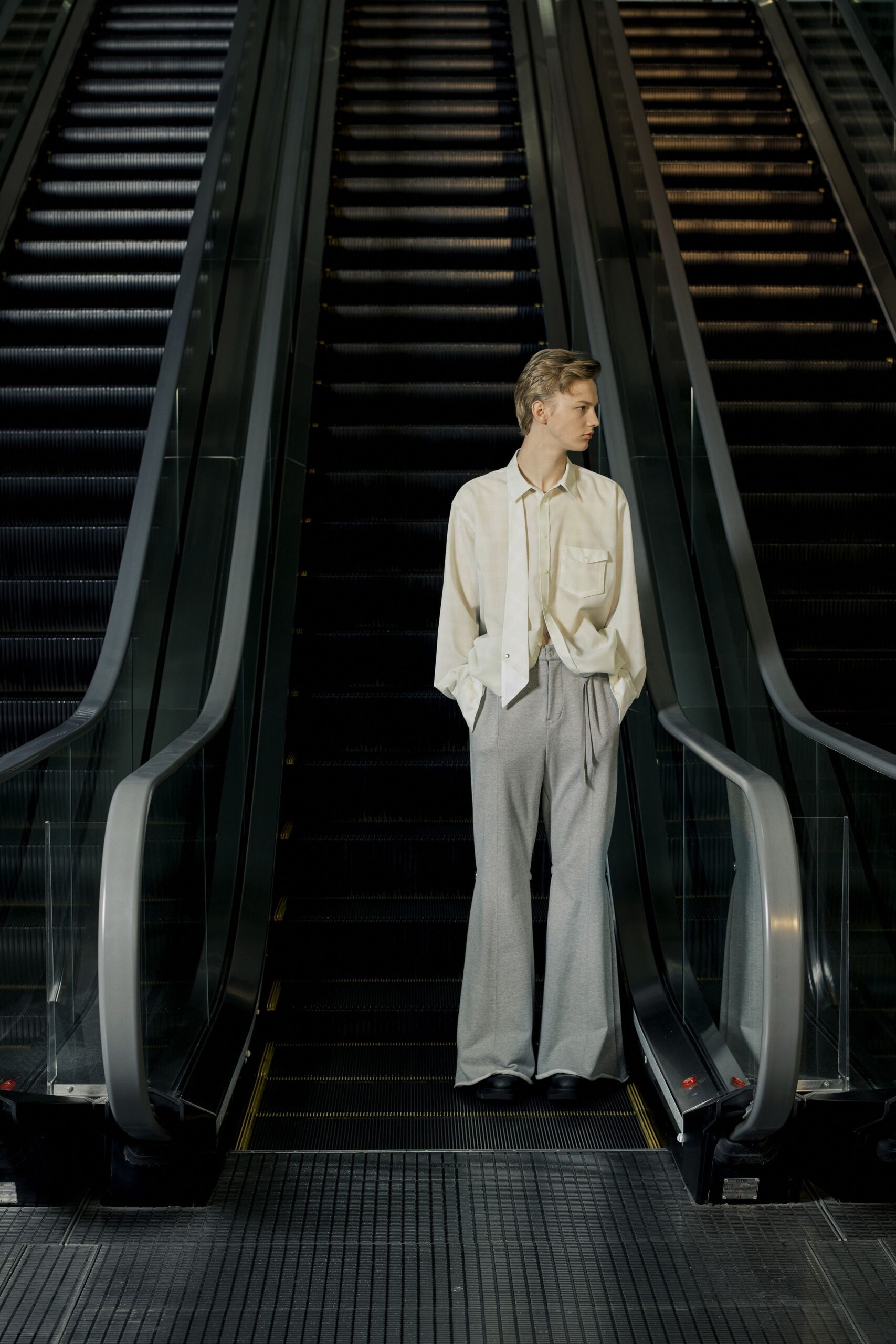 white relaxed shirt gray wide-leg pants
