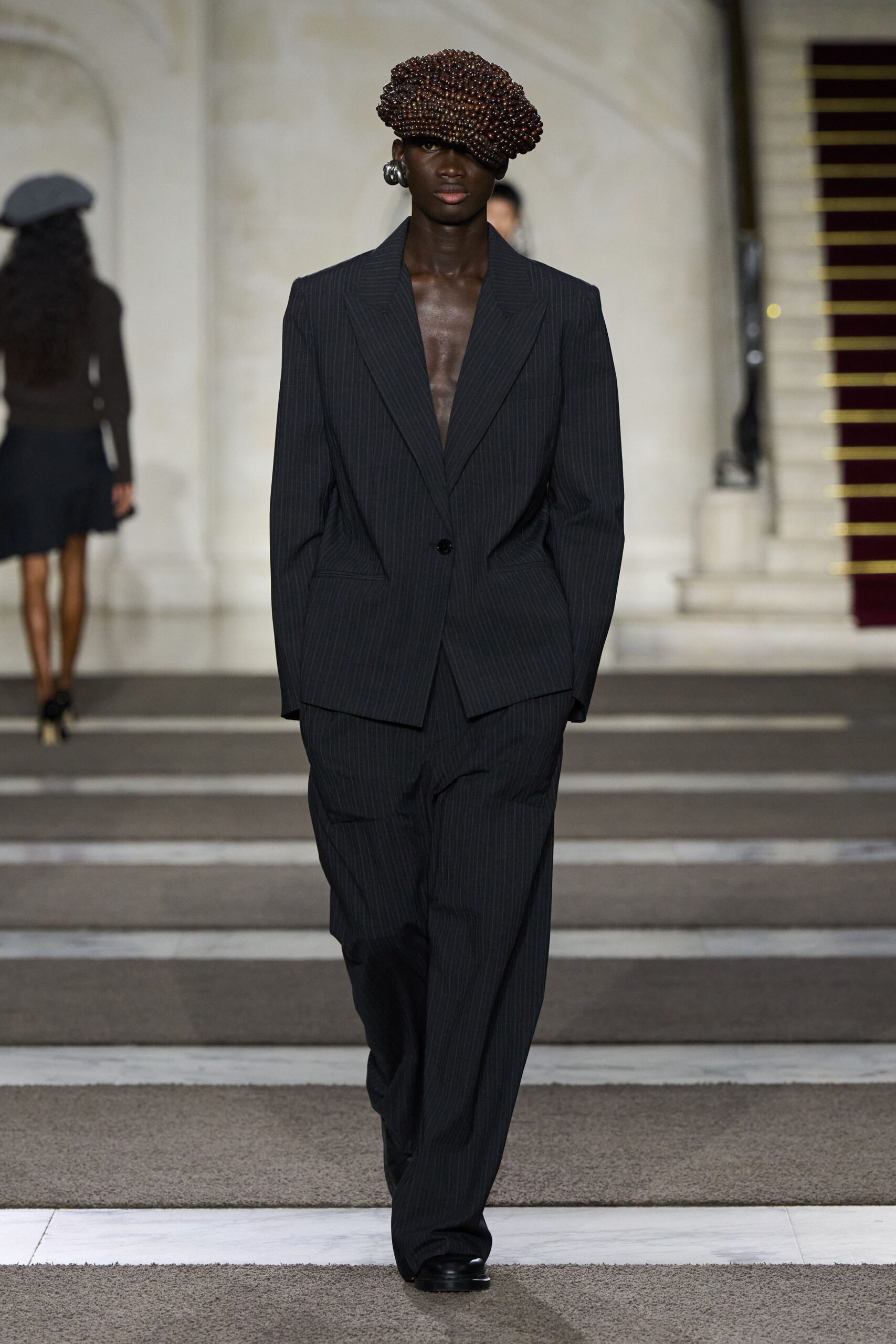 black tailored suit with hat