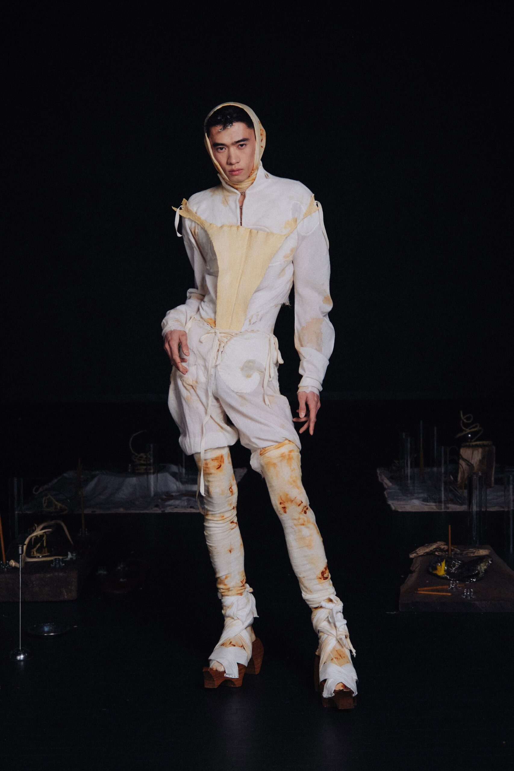 white cotton long-sleeve collared fitted draped zippered jumpsuit