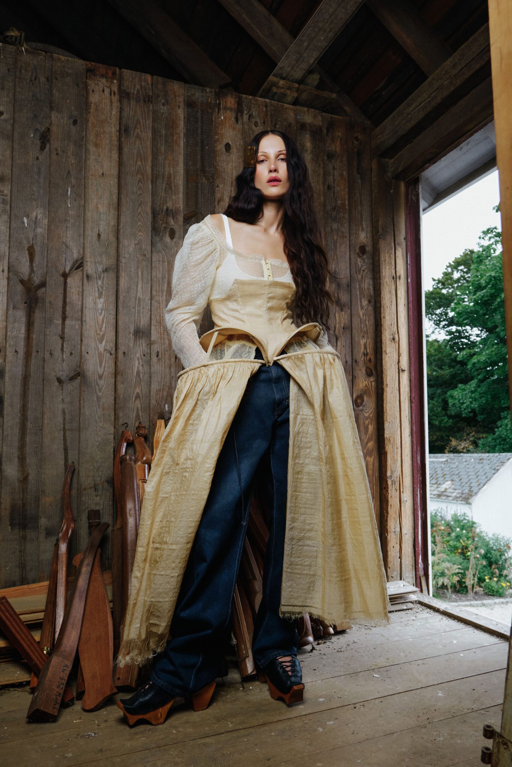 gold silk long-sleeve dress with denim pants