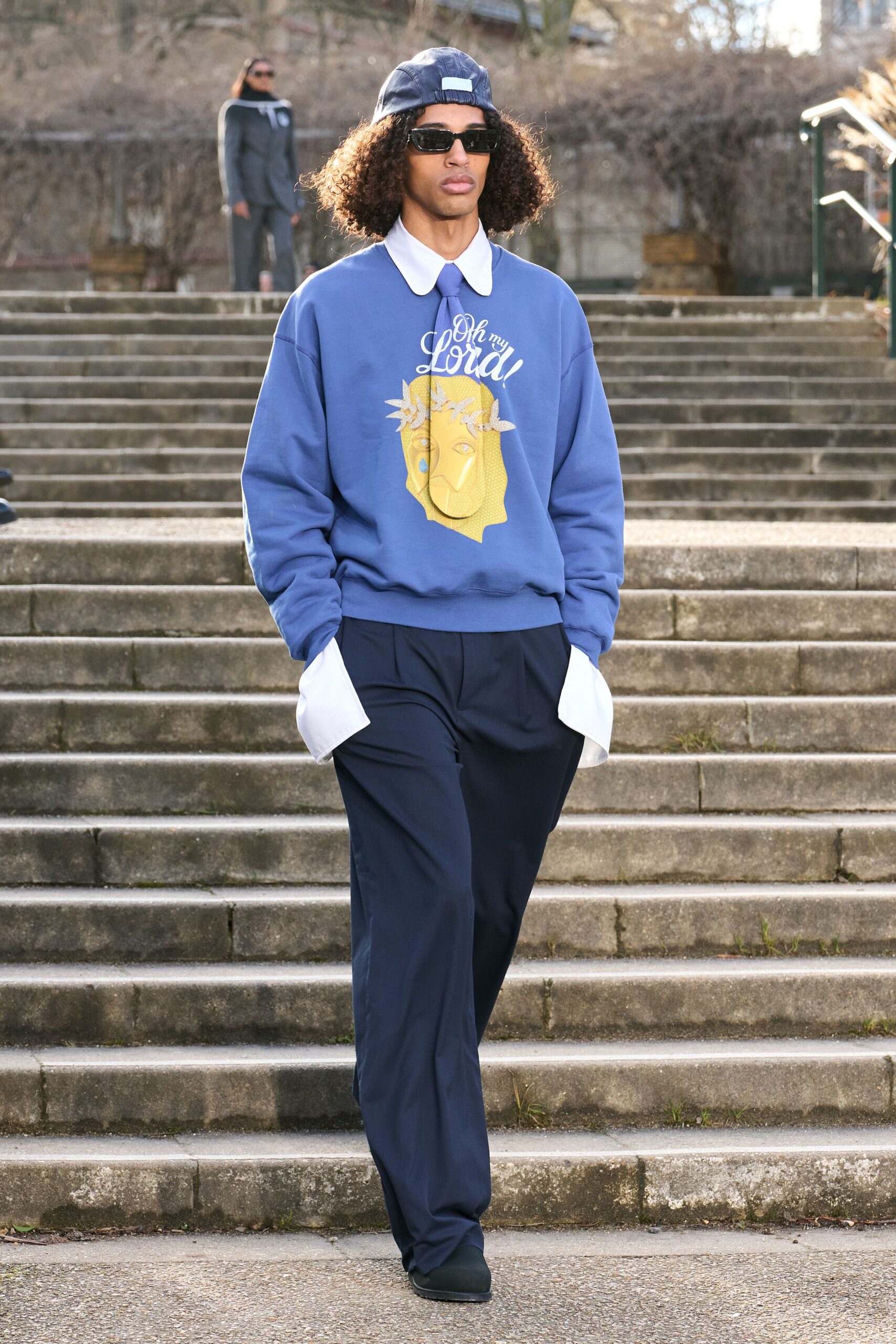 blue relaxed sweater with navy pants