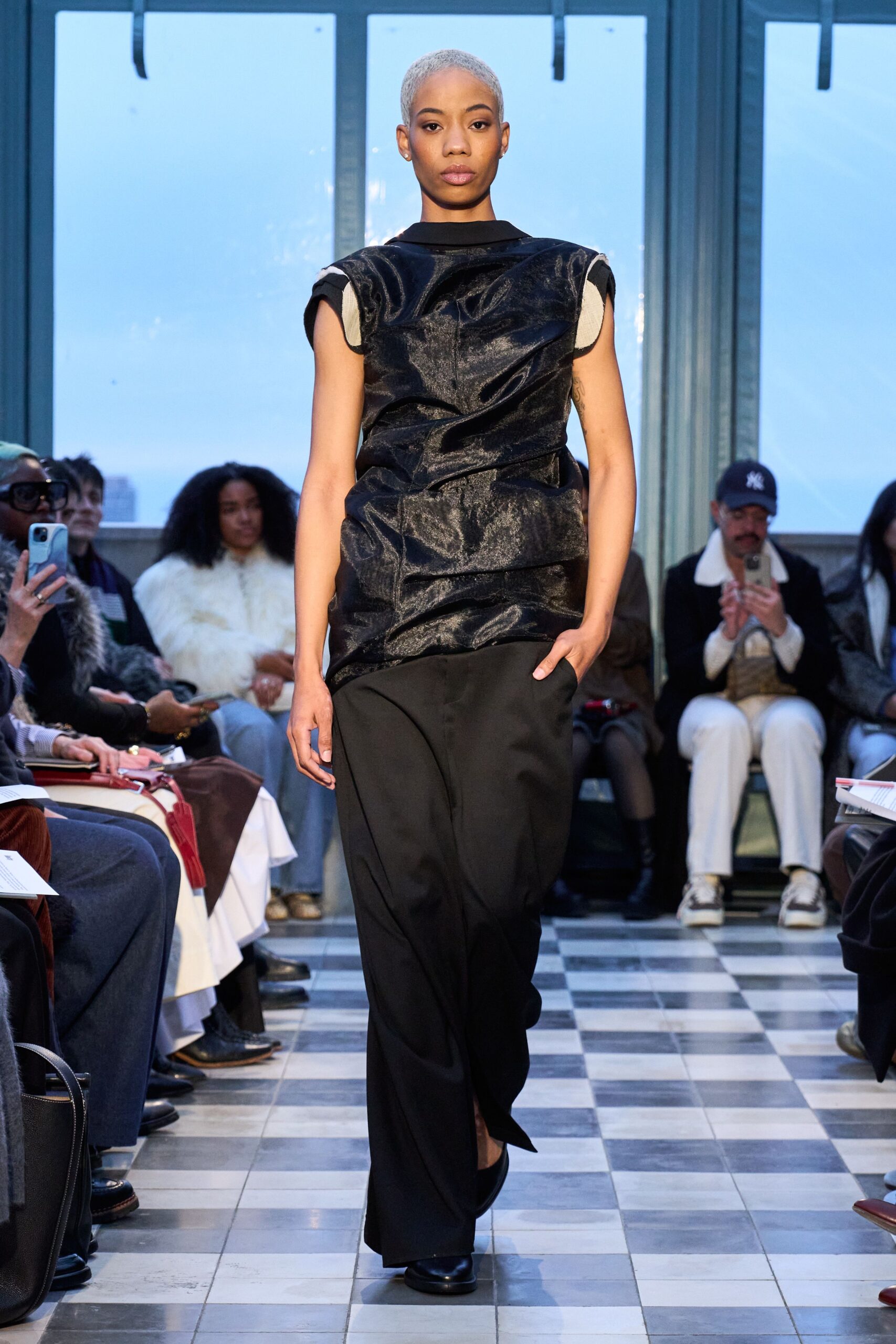 black silk sleeveless high-neck relaxed draped top